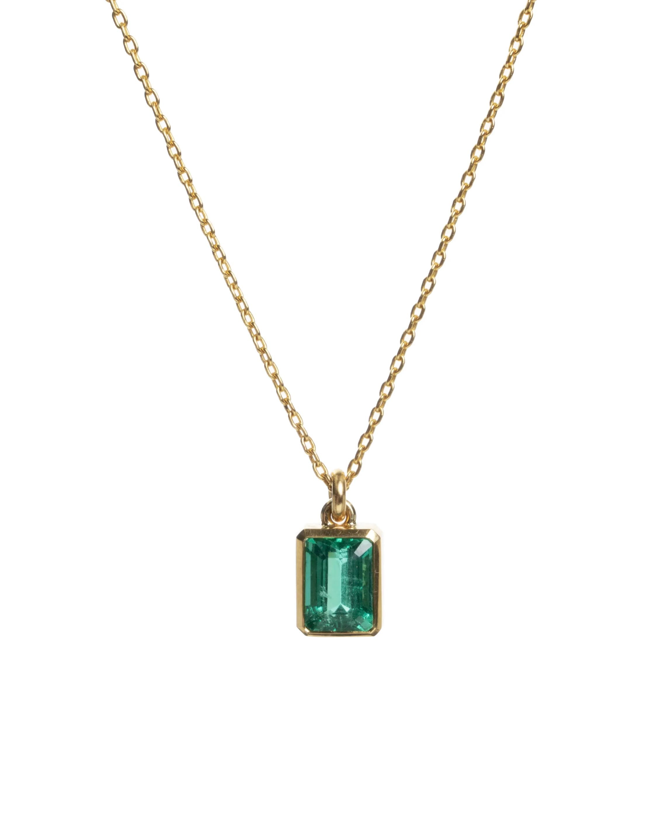 From our archive: Handmade Bell & Bird 2.07 carat emerald set in a crisp bezel setting in rich yellow 22k gold. The stone is certified to be of Brazilian origin. Sold