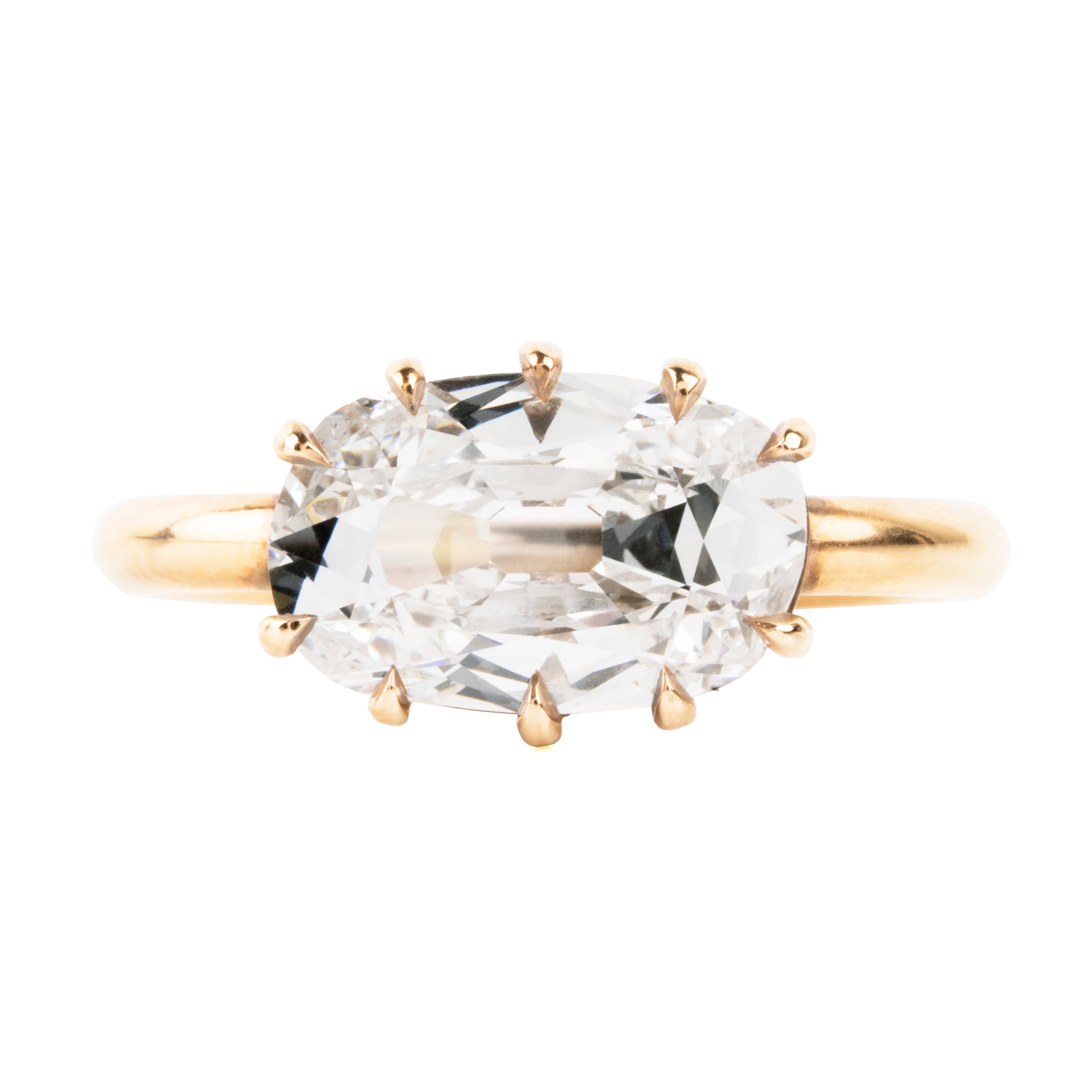 This ring features an unusual antique stone. GIA certified 3.06-carat antique elongated cushion cut diamond, E color, and SI2 clarity. The stone is presented in our handmade 'travel mount' setting in our 18k old gold.