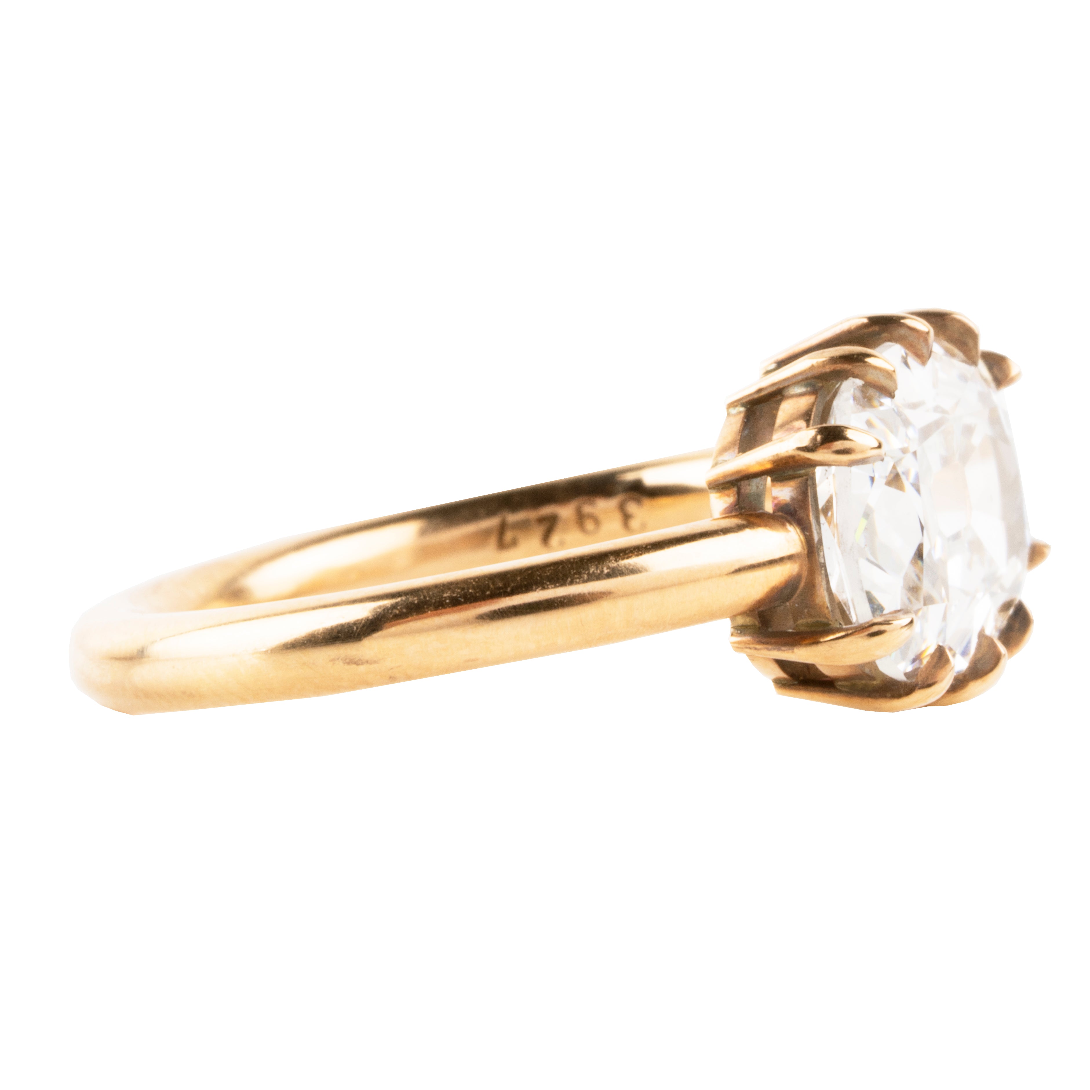 This ring features an unusual antique stone. GIA certified 3.06-carat antique elongated cushion cut diamond, E color, and SI2 clarity. The stone is presented in our handmade 'travel mount' setting in our 18k old gold.