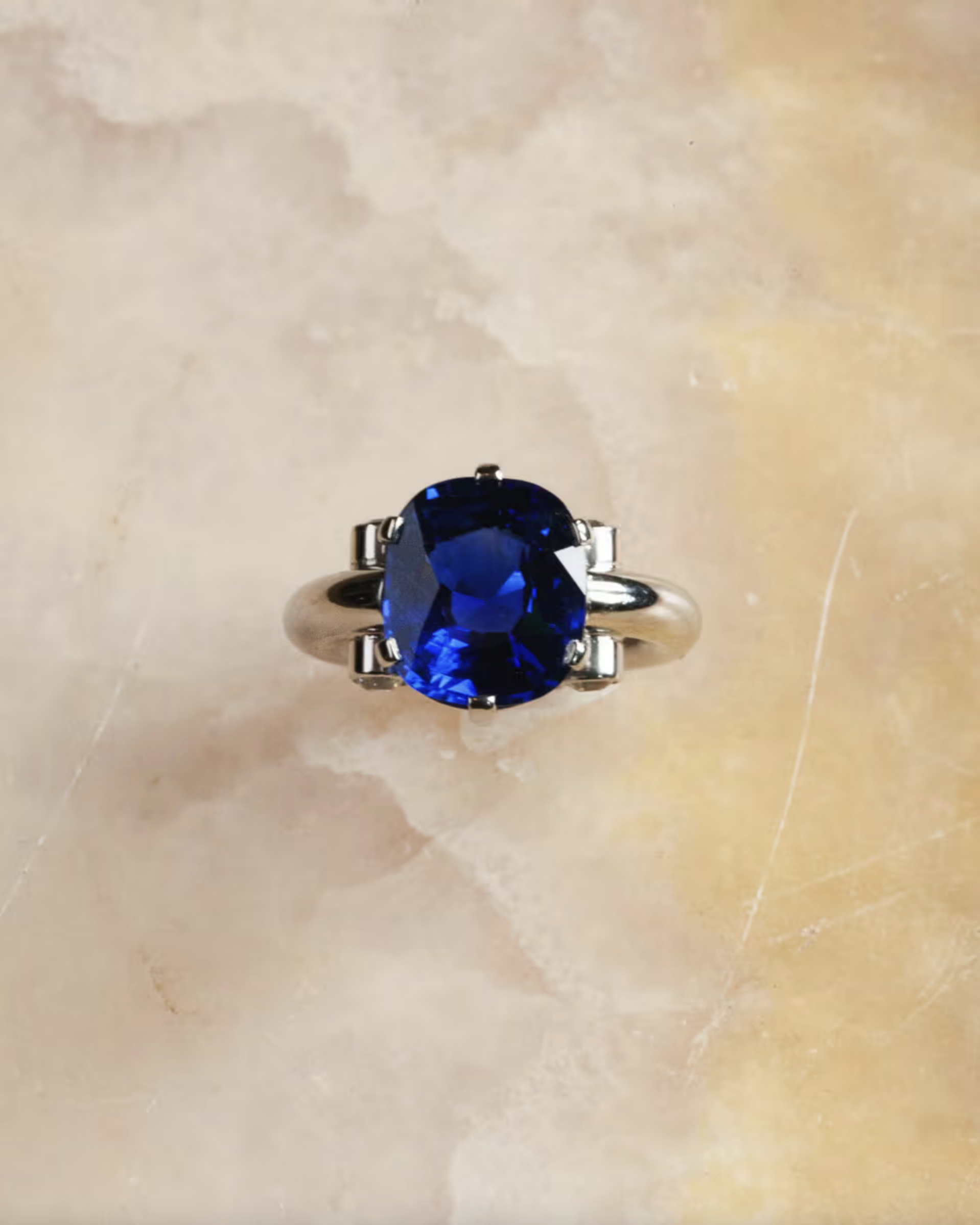 Bell and Bird Sapphire Ring with Diamonds in platinum