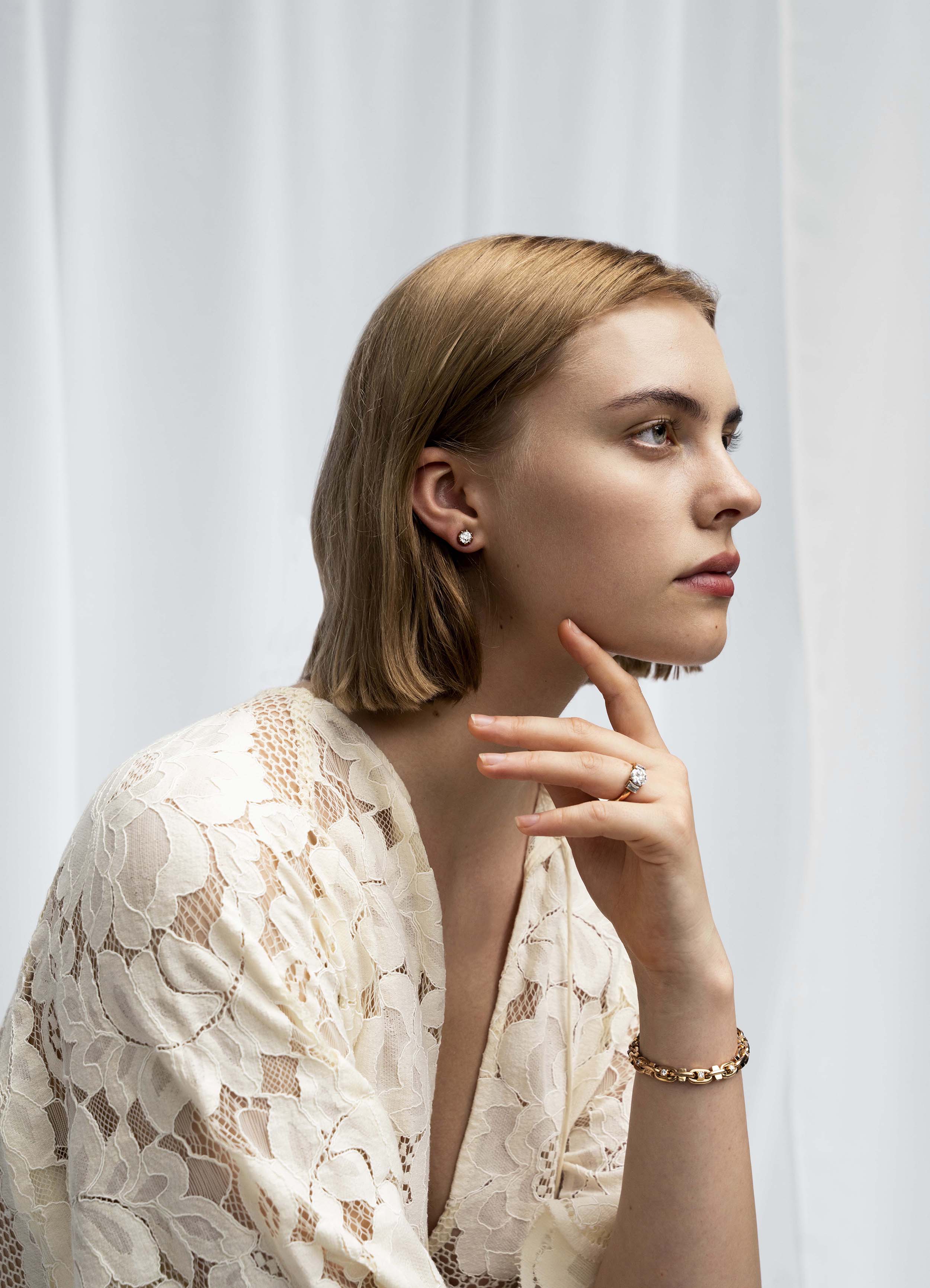 Bell and Bird diamond hobnail bracelet. Over 3 carats of old European cut diamonds are set in the links of the bracelet. The integrated clasp is entirely engineered and manufactured in our workshop. The natural diamonds are estimated to be G-H in color and VS clarity. This version is in our 18k old gold and measures 7.5 inches. The length can be adjusted.