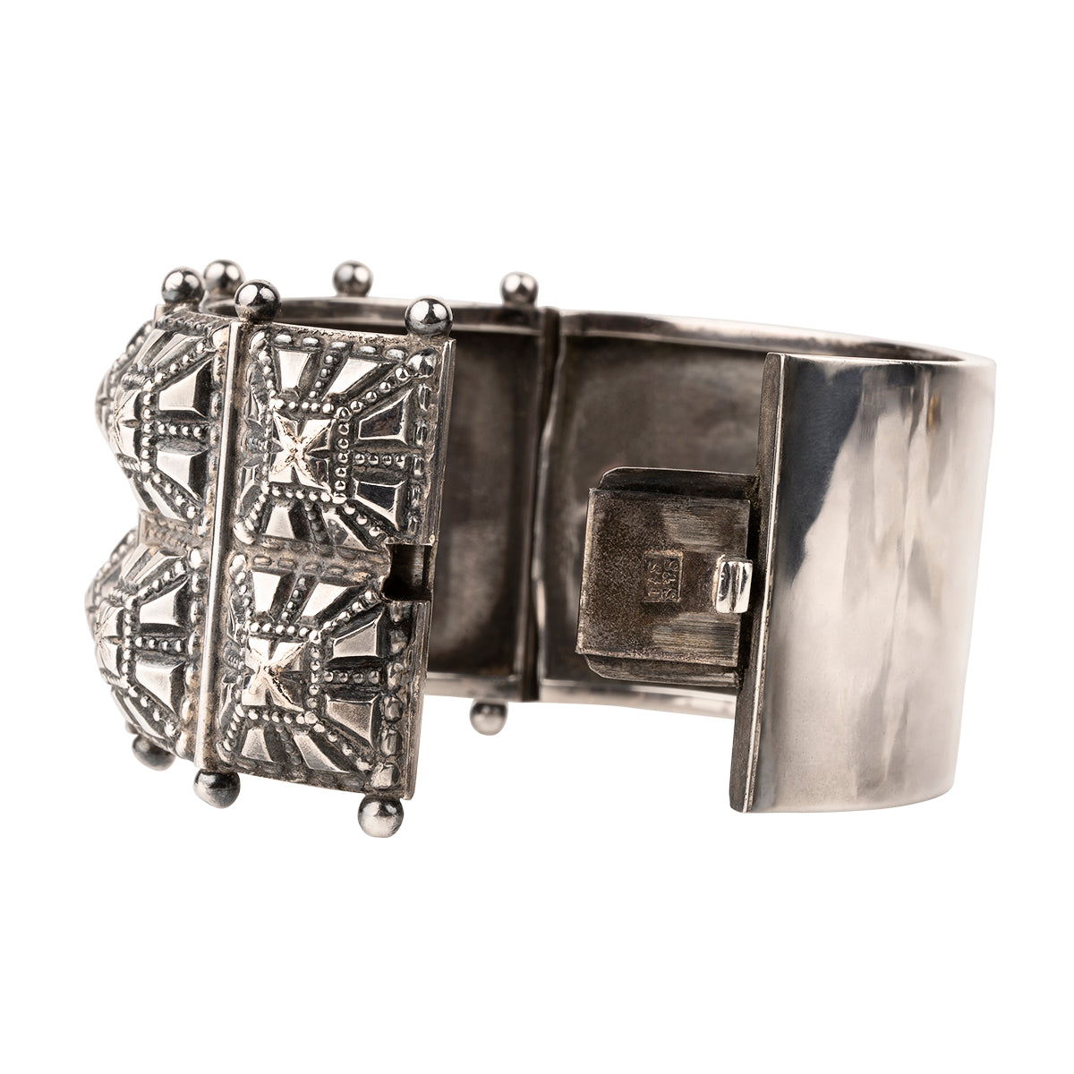 Victorian era wide sterling silver hobnail studded bangle. A bangle like this would have been the daytime jewel of choice for a well-appointed English woman of the 1870s and 80's. English in origin. Circa 1880.