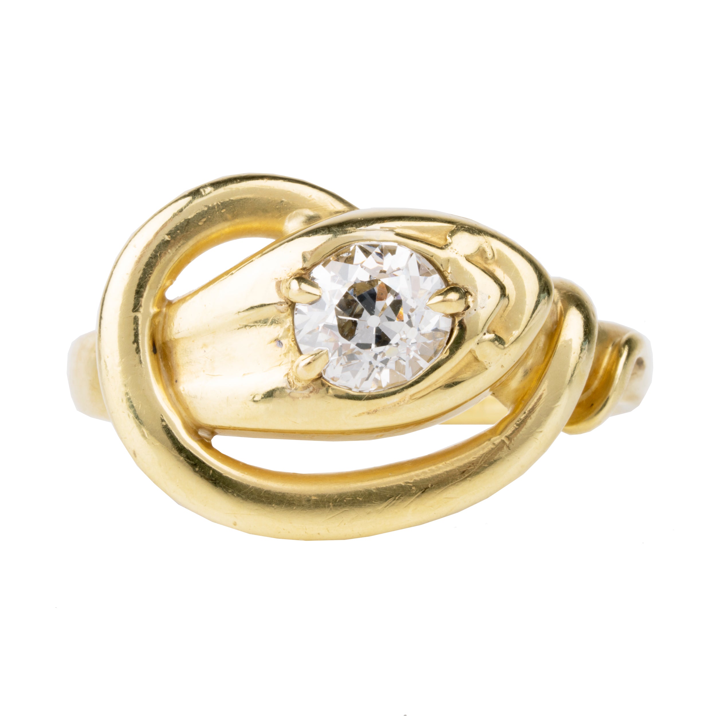 Victorian era diamond snake ring in 18k gold. An approximately 0.80 carat antique old European cut diamond in the head. English in origin. Circa 1890. Front view.