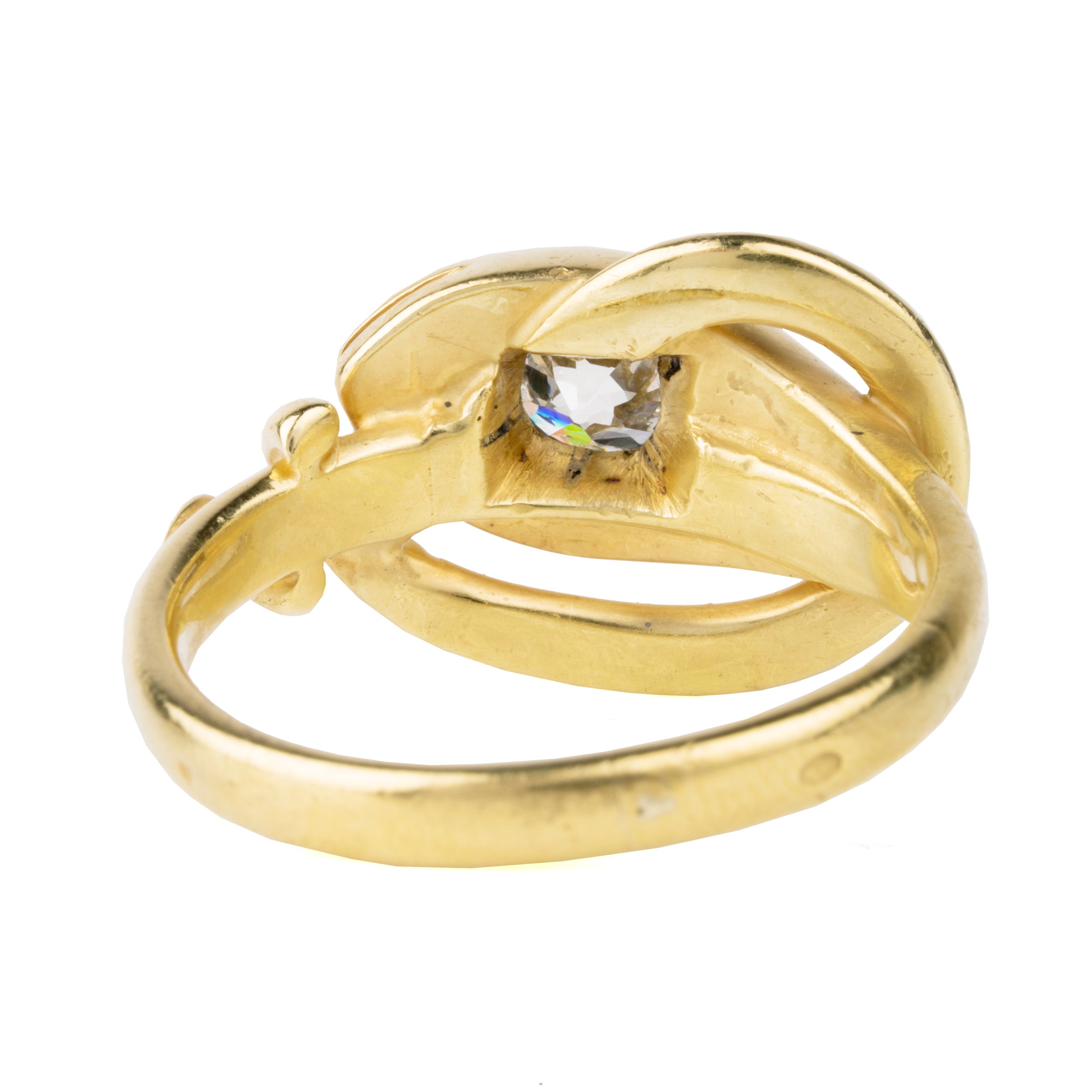 Victorian era diamond snake ring in 18k gold. An approximately 0.80 carat antique old European cut diamond in the head. English in origin. Circa 1890. Back view.