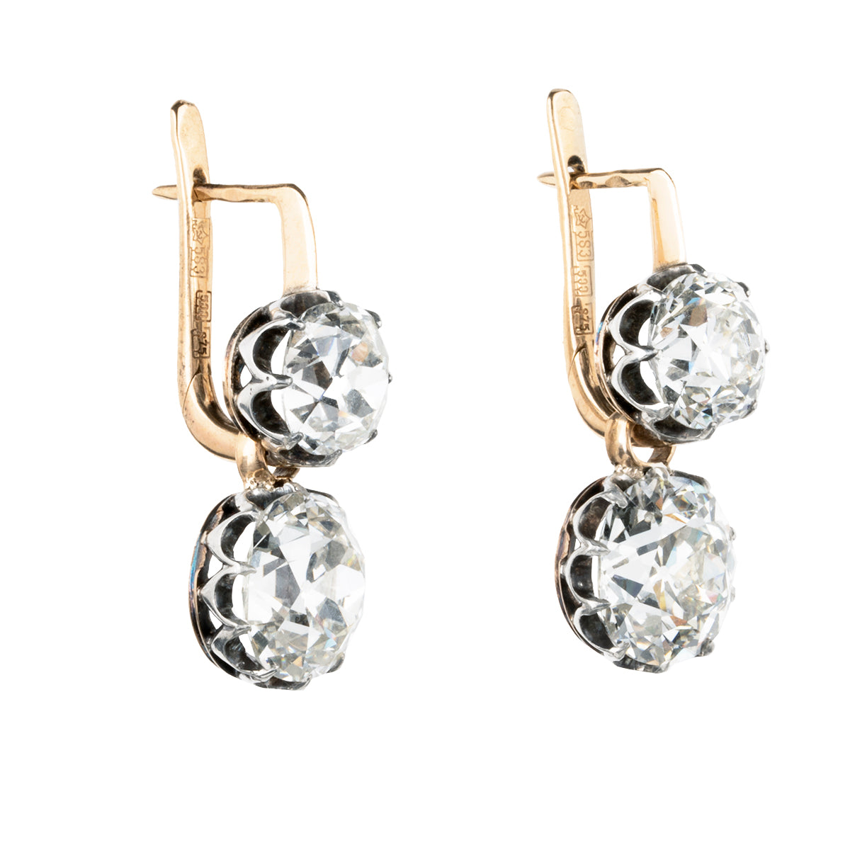 These earrings have an estimated nine carats in total weight. 4 cushion shaped, old mine cut diamonds are set in 14k gold and silver. The settings are arranged to allow a day-to-night function. The two smaller stones can be worn alone or with the larger drops. The smaller stones, weigh approx. 3 carats together. The two larger stones are certified by a French laboratory to be 2.87 carats, L color, and VS1 clarity and 2.96 carats, K color, VS1 clarity. European and French makers marks. side view.