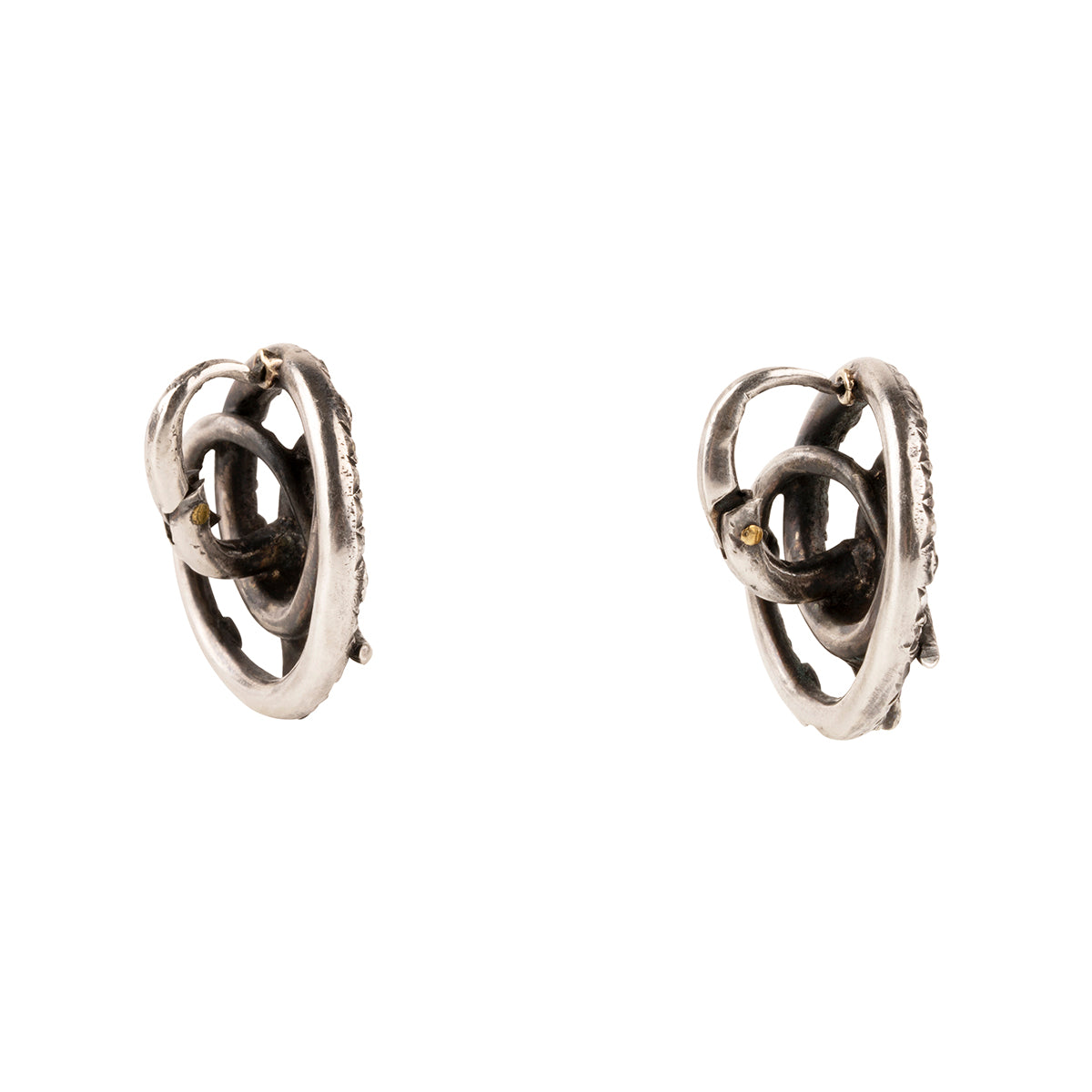 Georgian era diamond and emerald coiled snake earrings, set in silver. A mixture of rose cut diamonds and emeralds on the body and rubies for eyes. Continental Europe. Circa 1790. Side view.