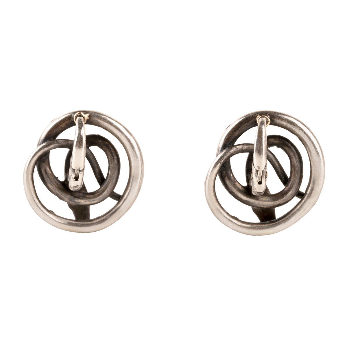 Georgian era diamond and emerald coiled snake earrings, set in silver. A mixture of rose cut diamonds and emeralds on the body and rubies for eyes. Continental Europe. Circa 1790. Back view.