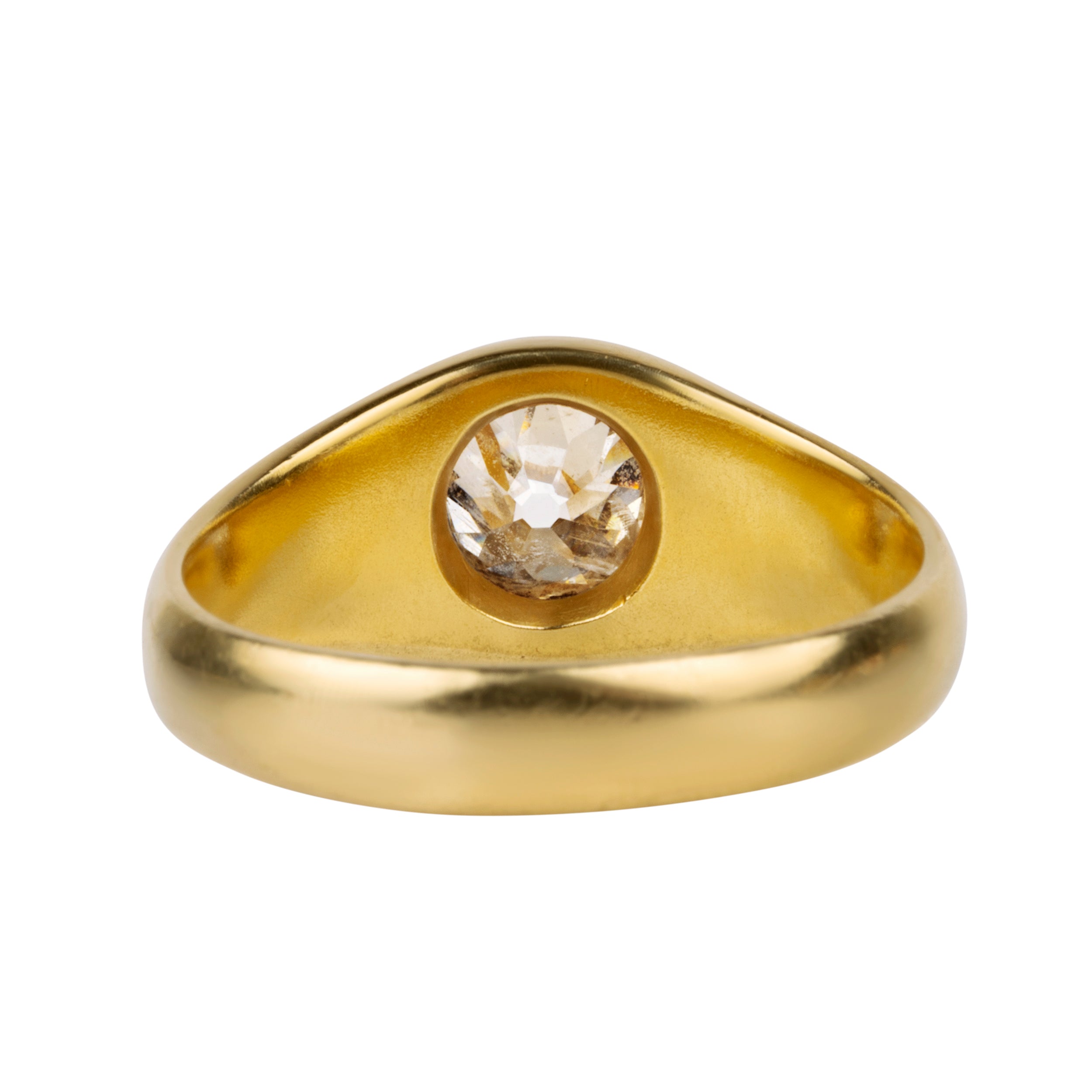 Victorian era flush set diamond solitaire ring. A lovely heavy 18k yellow gold with a single old mine cut diamond approx 1.25 cts, H color. American in origin. Circa 1890. Backside view.