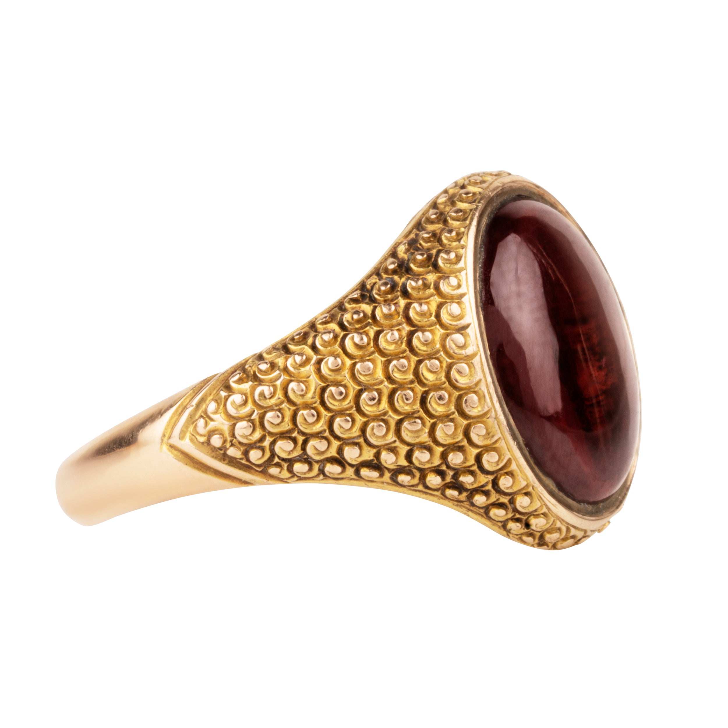 Victorian era garnet cabochon signet ring in 18k gold. Hand engraved "The Jubilee, LC& E, Tabram, Married March 30, 1815." English in origin. Likely made in 1865. Side View.