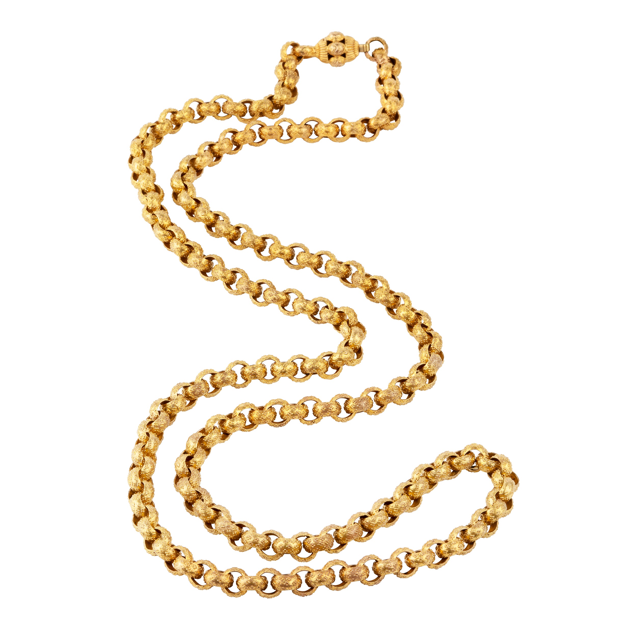 Georgian era long pinchbeck chain. Full long-length chain with oversized textured links and an elaborate barrel clasp. Can be worn full-length or layered. England. Circa 1820.