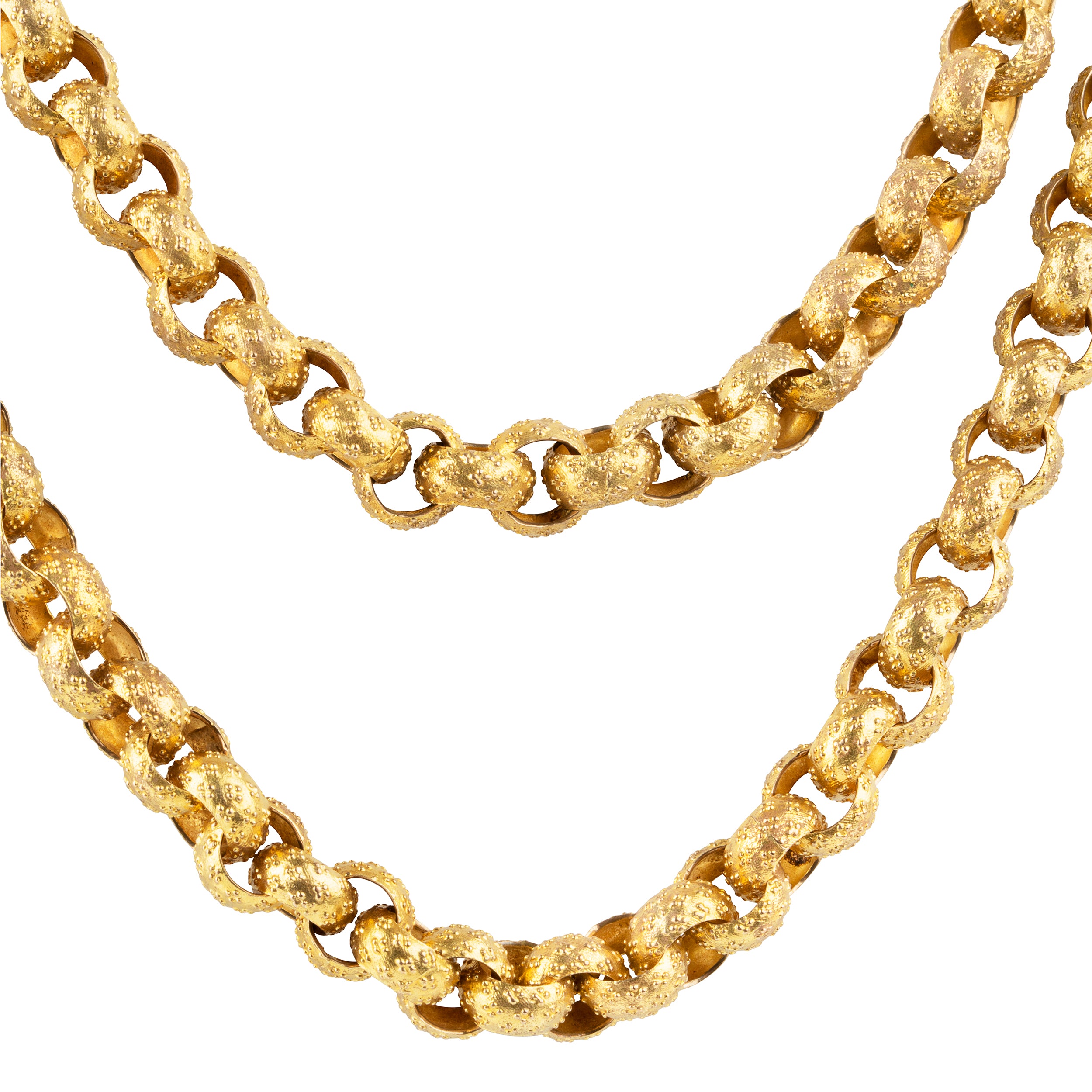 Georgian era long pinchbeck chain. Full long-length chain with oversized textured links and an elaborate barrel clasp. Can be worn full-length or layered. England. Circa 1820.