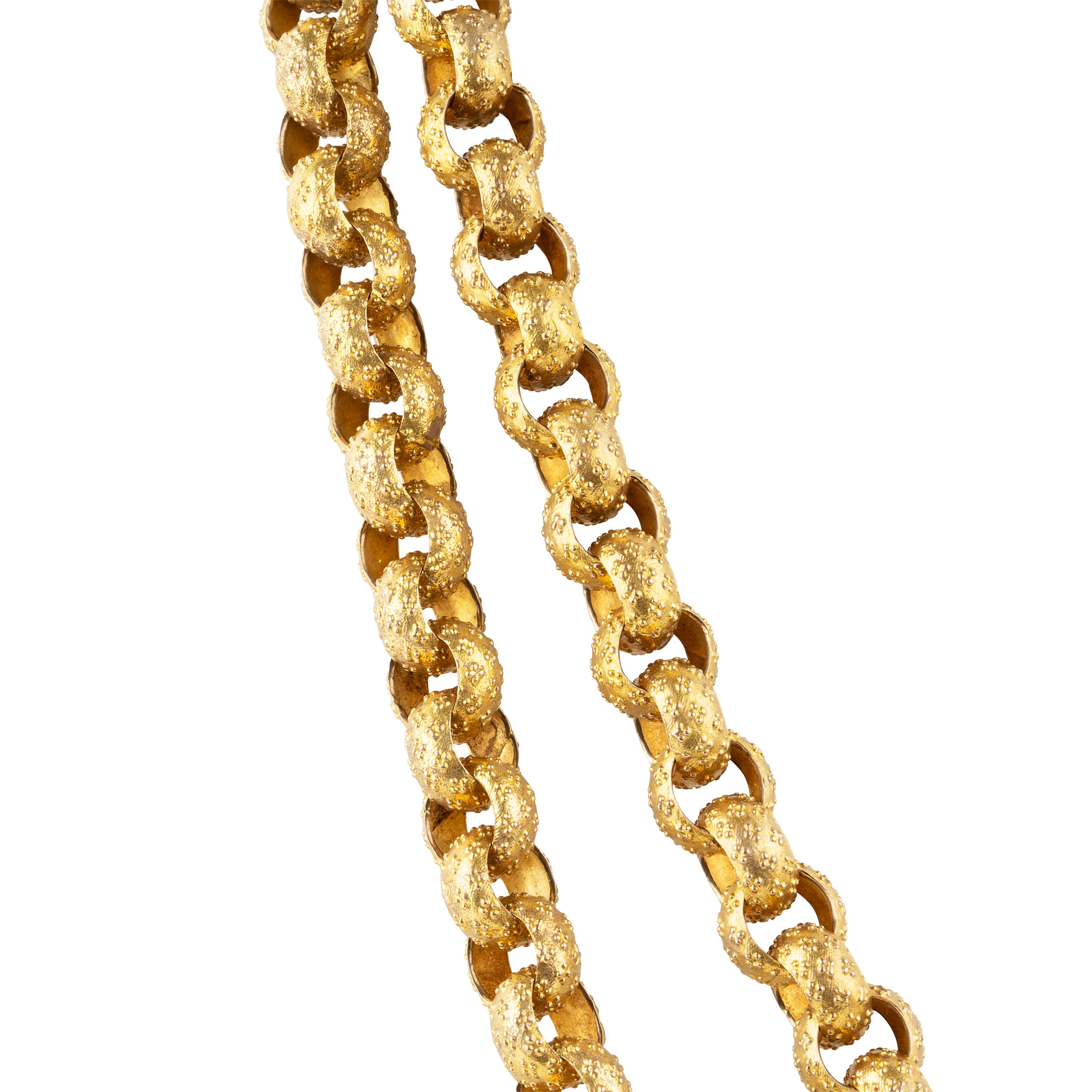 Georgian era long pinchbeck chain. Full long-length chain with oversized textured links and an elaborate barrel clasp. Can be worn full-length or layered. England. Circa 1820.