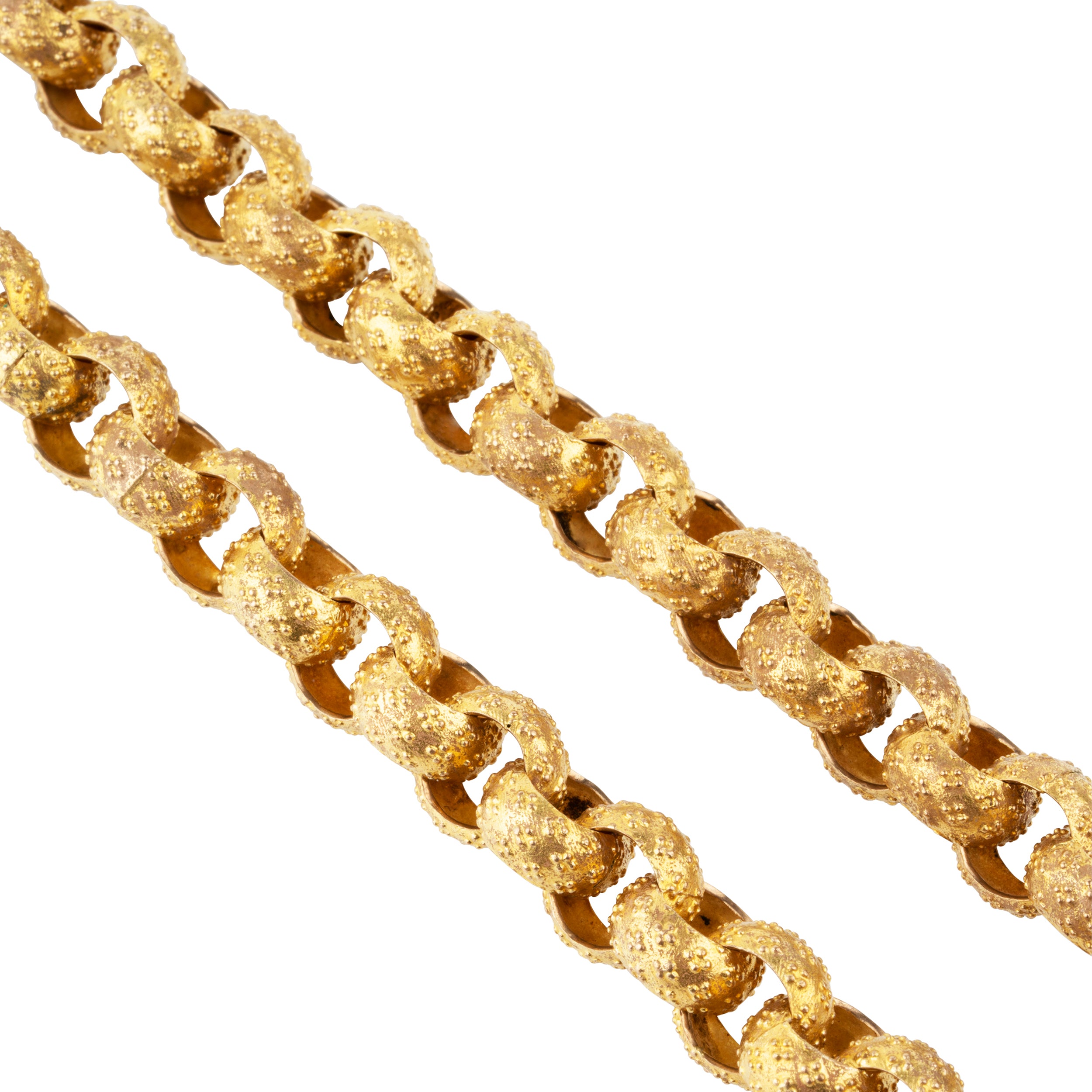 Georgian era long pinchbeck chain. Full long-length chain with oversized textured links and an elaborate barrel clasp. Can be worn full-length or layered. England. Circa 1820.