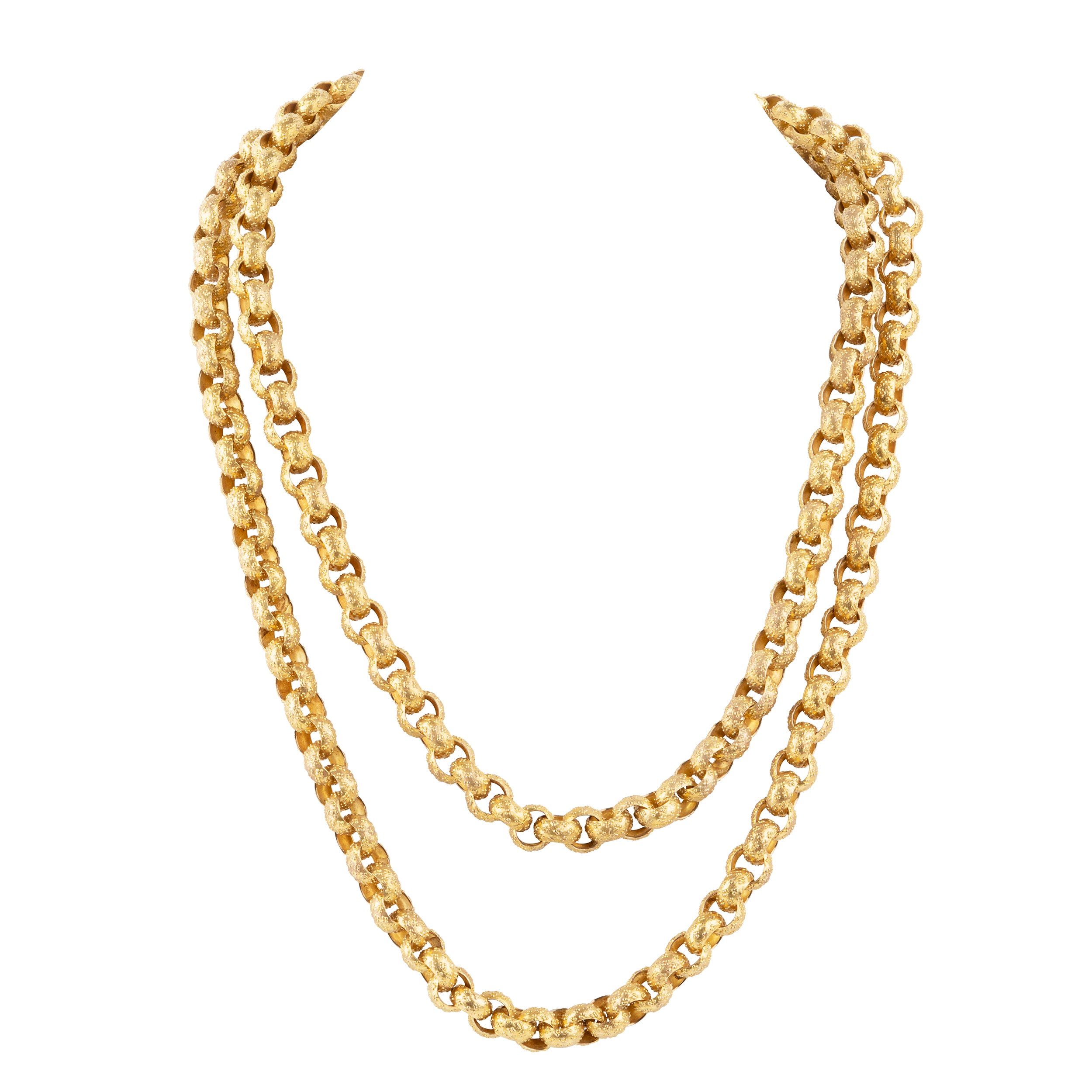 Georgian era long pinchbeck chain. Full long-length chain with oversized textured links and an elaborate barrel clasp. Can be worn full-length or layered. England. Circa 1820.