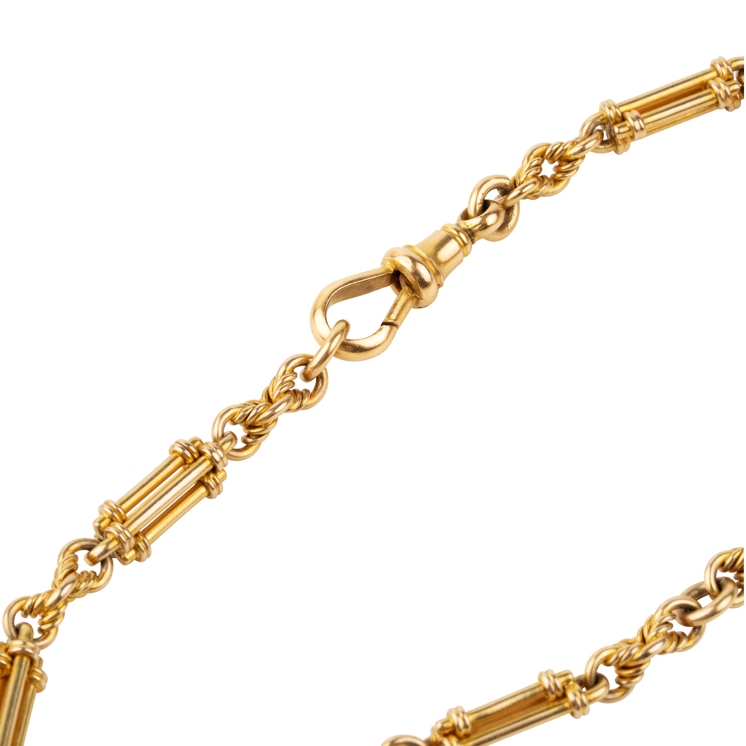 A petite but intricate watch chain bracelet. A deep yellow 18k gold is formed in bar and twisted links. Originally part of a 19th-century watch chain, this piece is robust enough to wear every day and be an addition to a bracelet stack or worn alone.While the bracelet is not bulky, there is still a nice weight to it as each element is solid. There is one bar element that has been lost with time, pictured.England. Circa 1870.