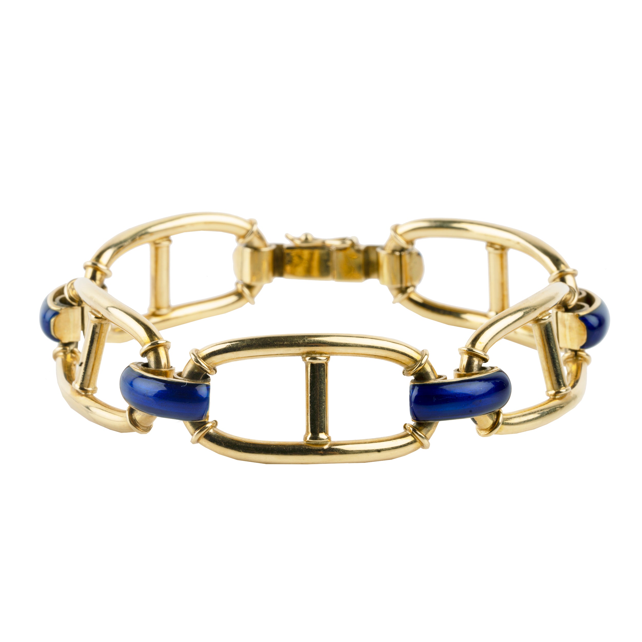 A nice anchor link bracelet with cobalt blue links between bright 18k yellow gold nautical chain links. Solid heavy links. Perfect for everyday wear. Circa 1960.