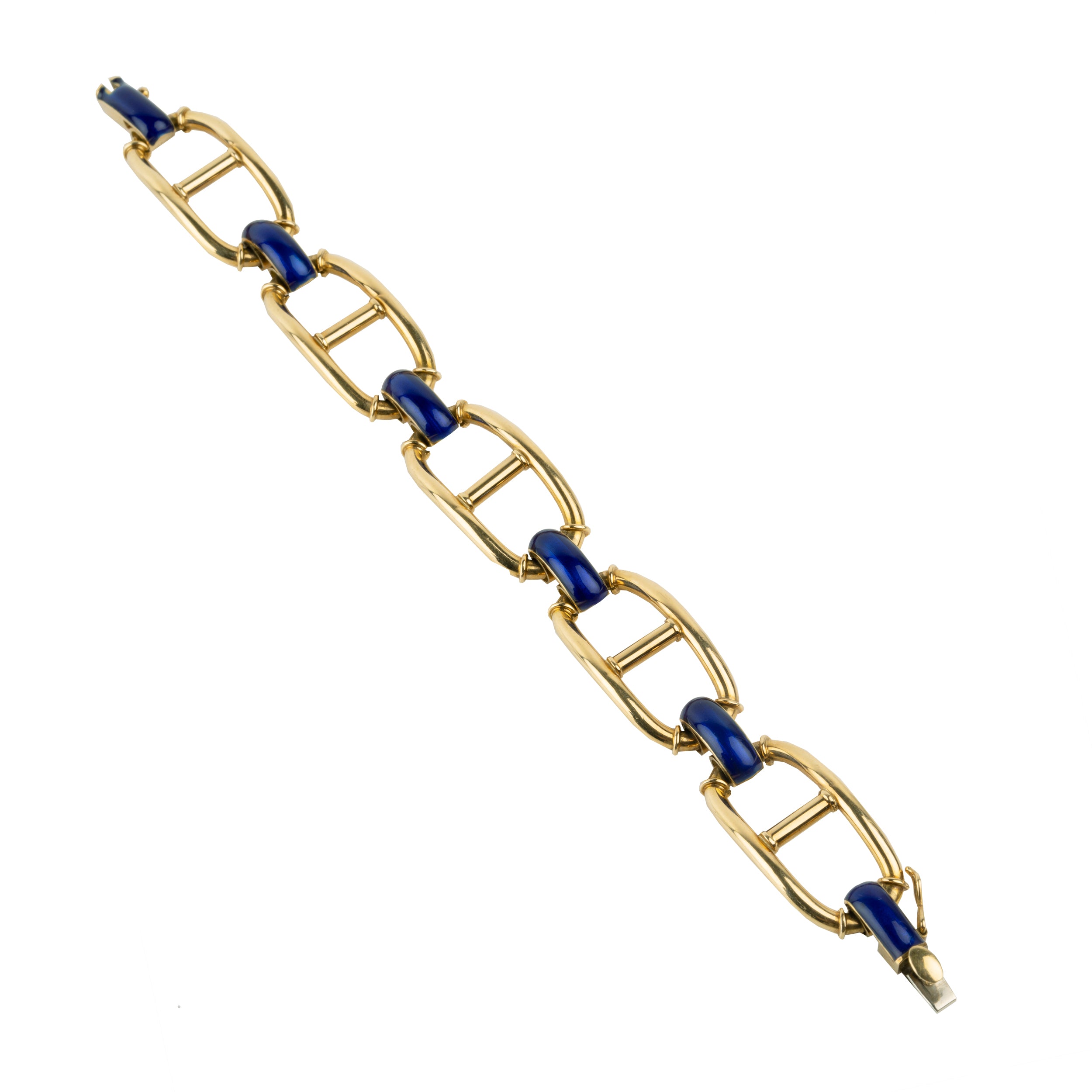 A nice anchor link bracelet with cobalt blue links between bright 18k yellow gold nautical chain links. Solid heavy links. Perfect for everyday wear. Circa 1960.