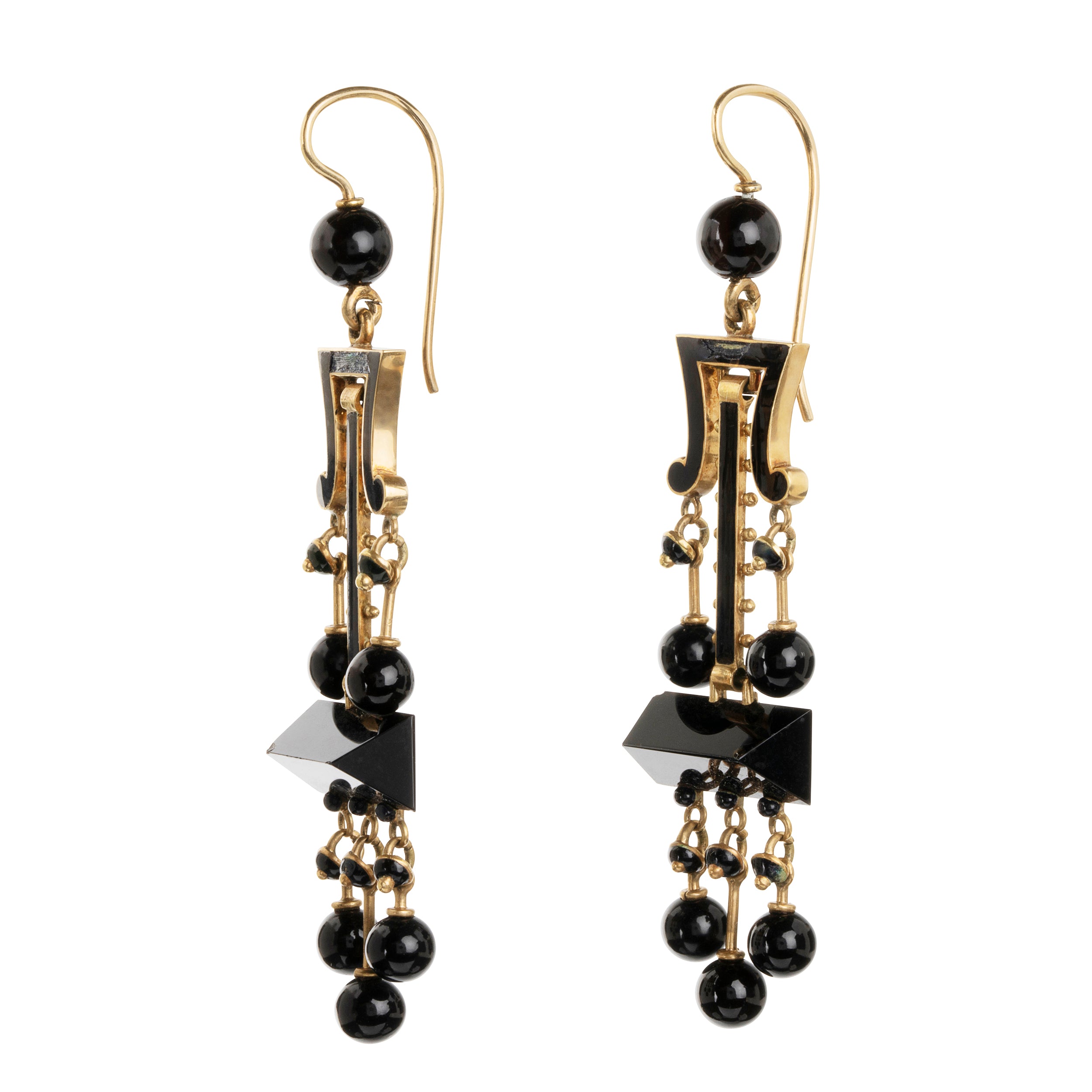 19th Century Tiffany & Company onyx earrings and brooch, in 18k gold. Carved onyx and black enamel details with the original box. American. Circa 1870.