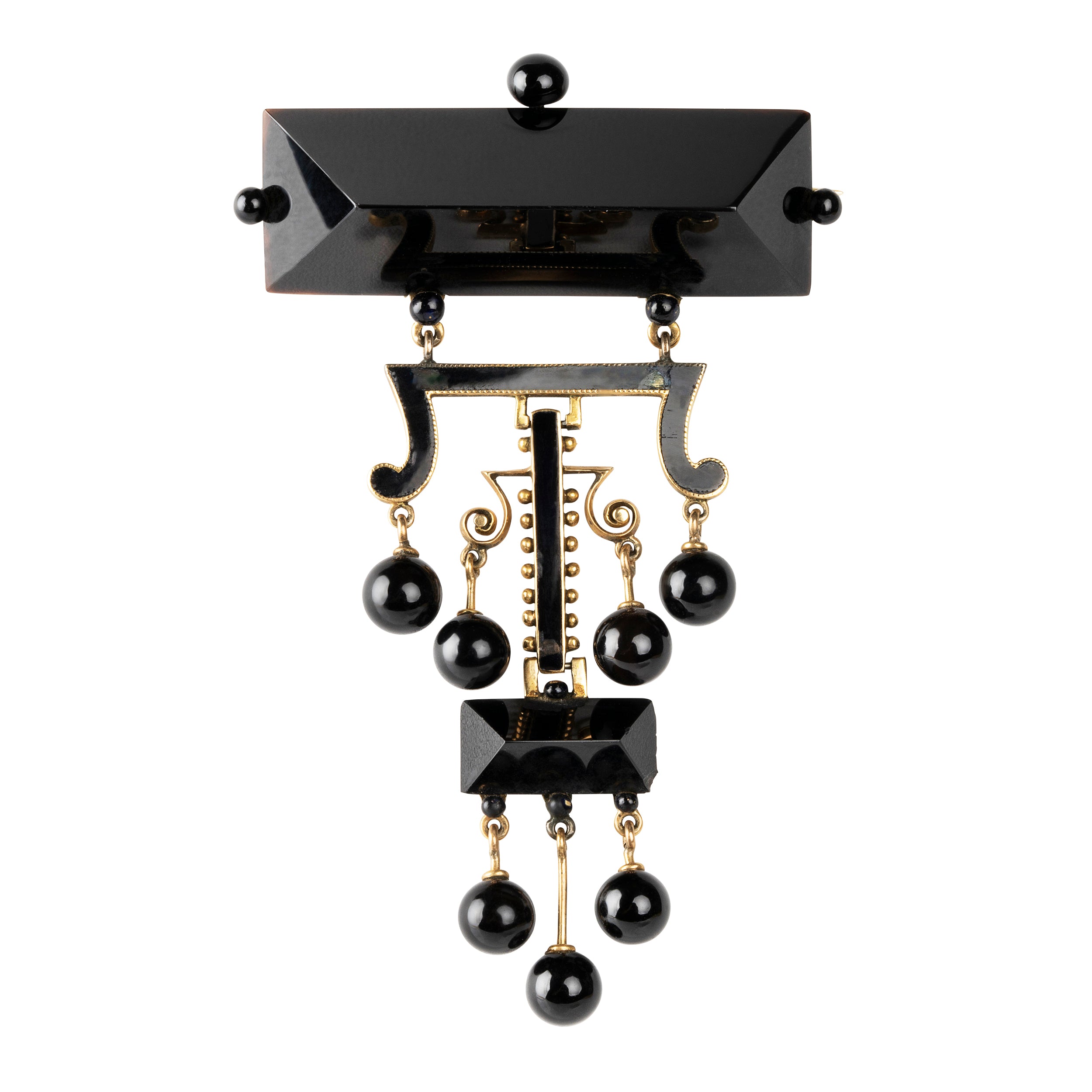 19th Century Tiffany & Company onyx earrings and brooch, in 18k gold. Carved onyx and black enamel details with the original box. American. Circa 1870.