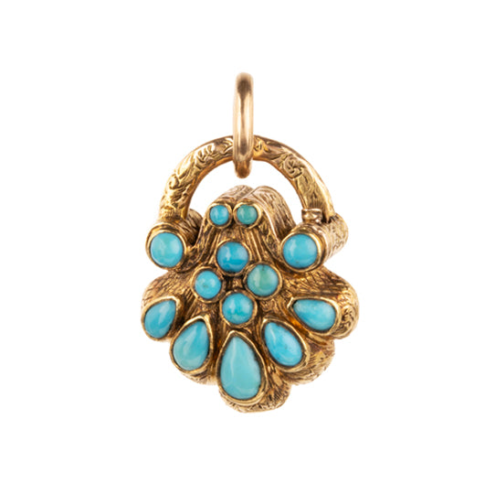 Early Victorian era turquoise padlock locket in 15k gold. It is in the form of a shell with Persian turquoise and a glazed compartment. English in origin. Circa 1840. Hanging on an antique 15k gold turquoise beaded ball chain.