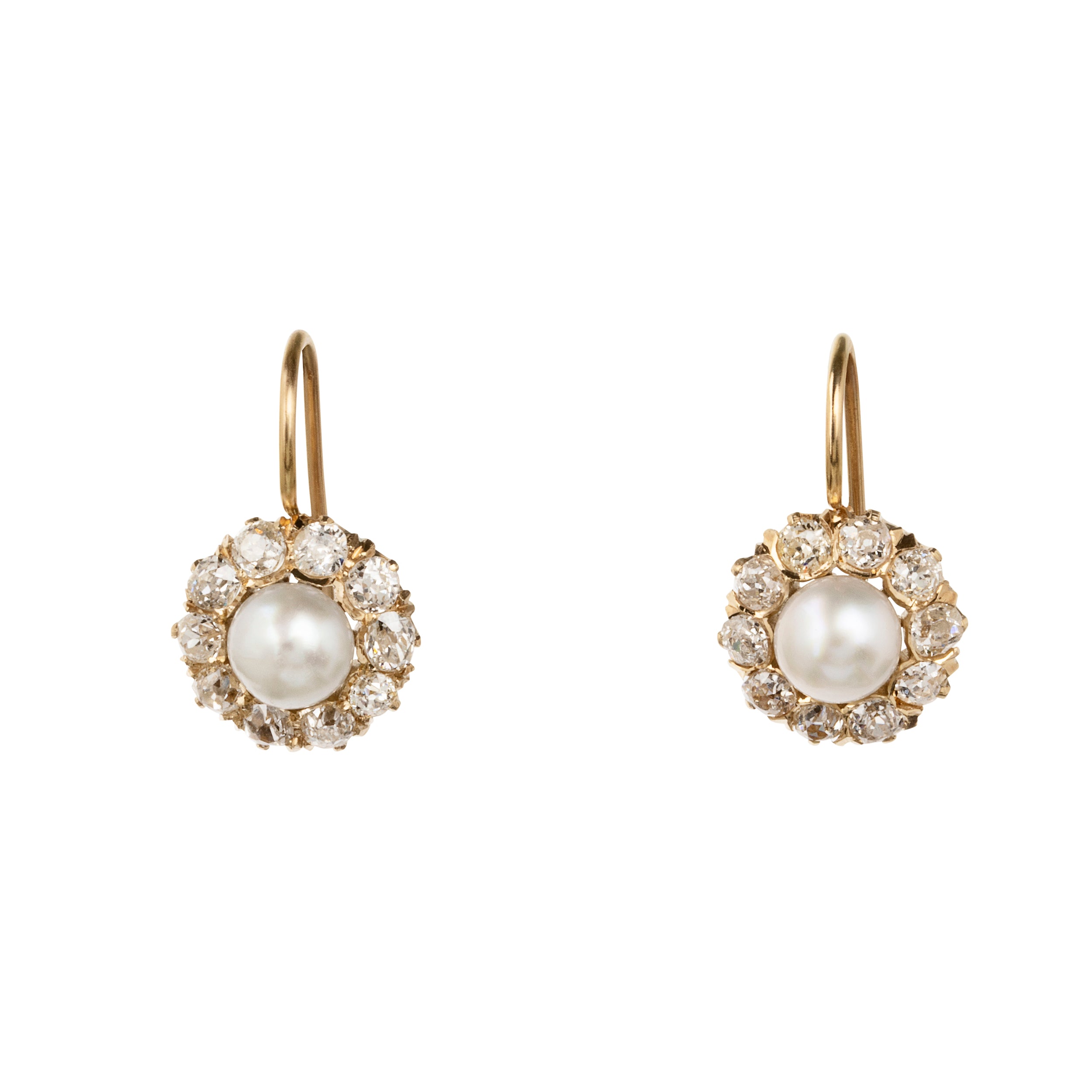 19th Century diamond and pearl cluster earrings. Once elements of a larger piece, later converted into earrings.Presumably Russian, found in Finland. Circa 1890.