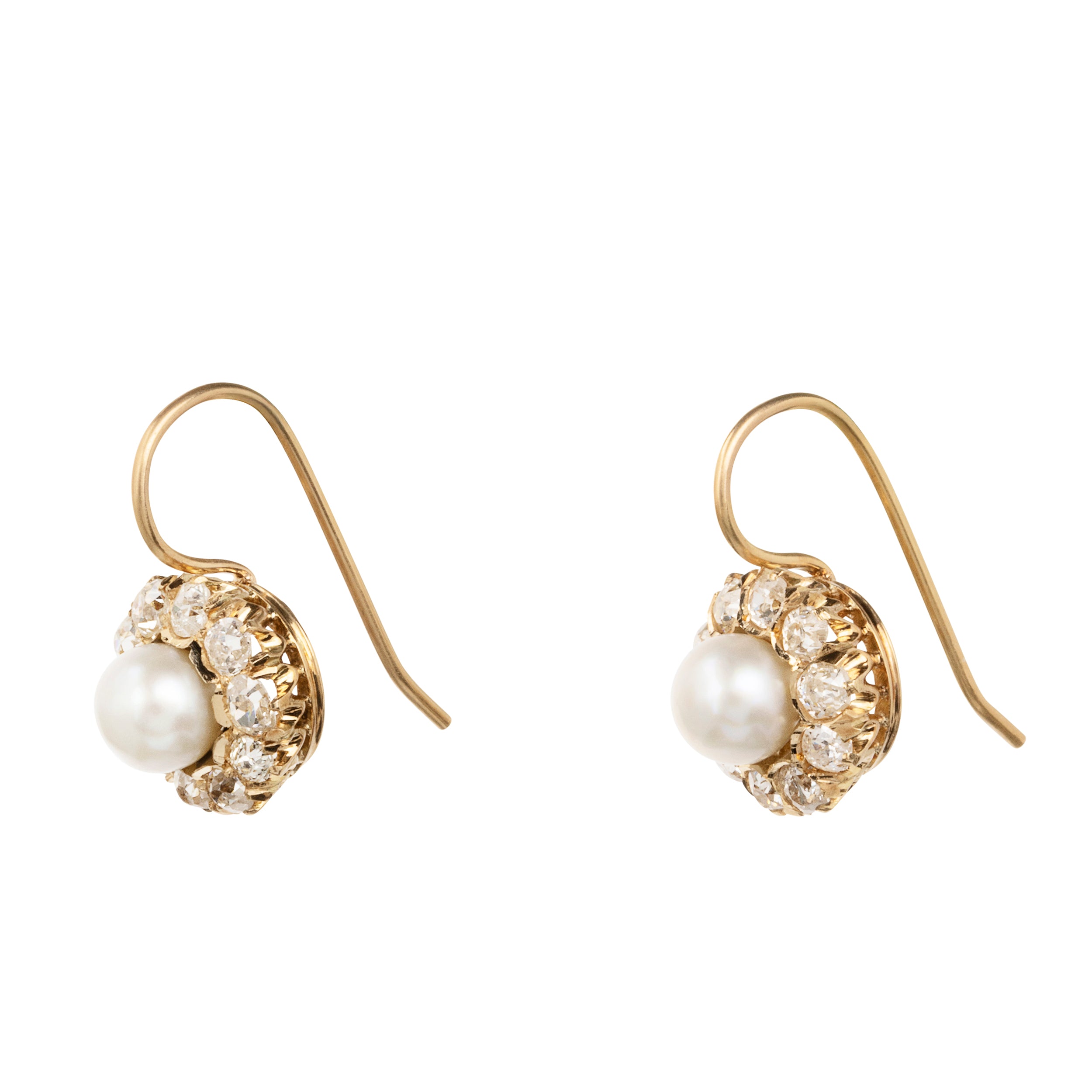 19th Century diamond and pearl cluster earrings. Once elements of a larger piece, later converted into earrings.Presumably Russian, found in Finland. Circa 1890.