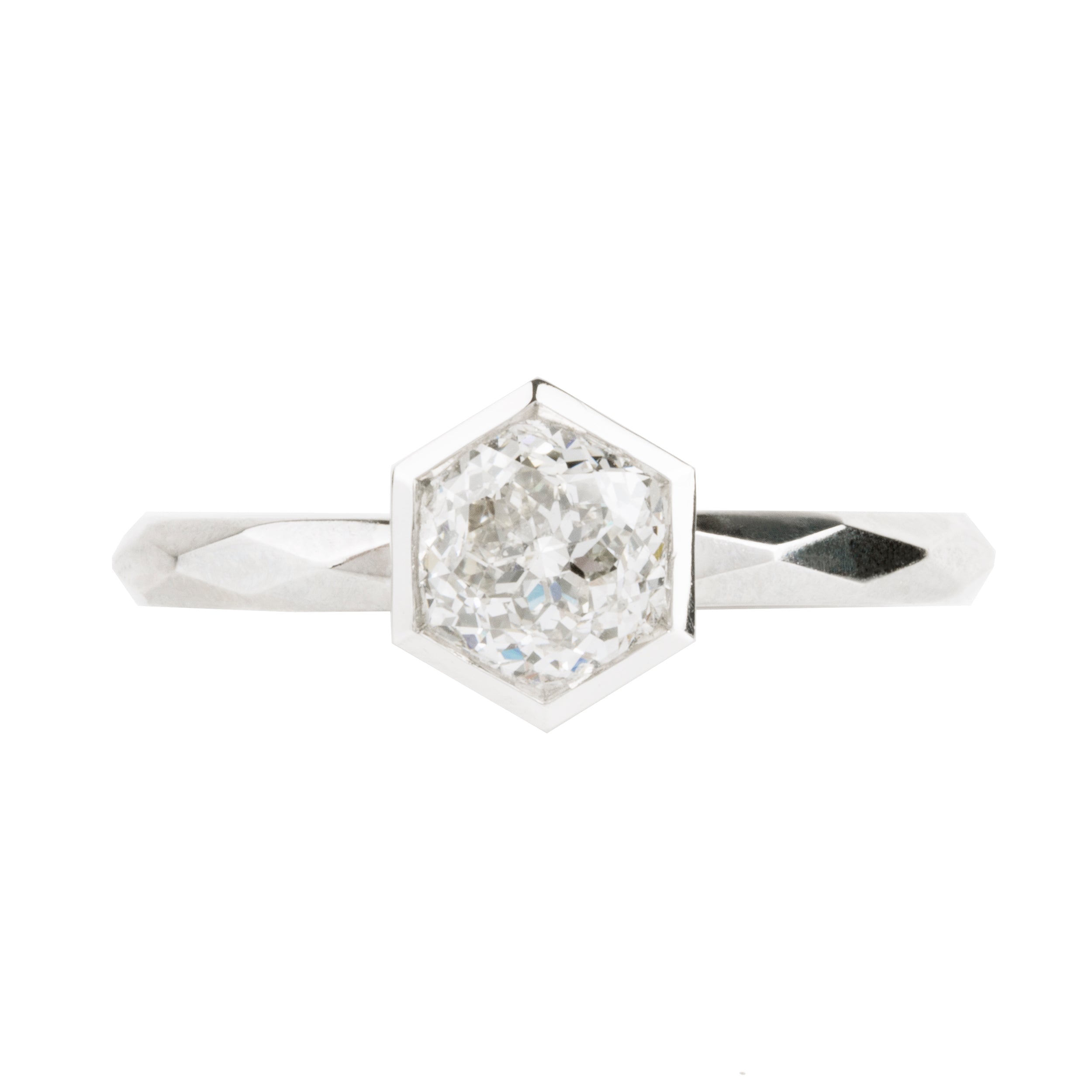 Bell and Bird No. 3929 platinum solitaire ring. Hand facetted band and hexagonal setting with an unusual early 20th century Jubilee cut diamond. This ring features a GIA certified Jubilee cut diamond, 1.10 carat, J color and VS1 clarity.Handcrafted in platinum.