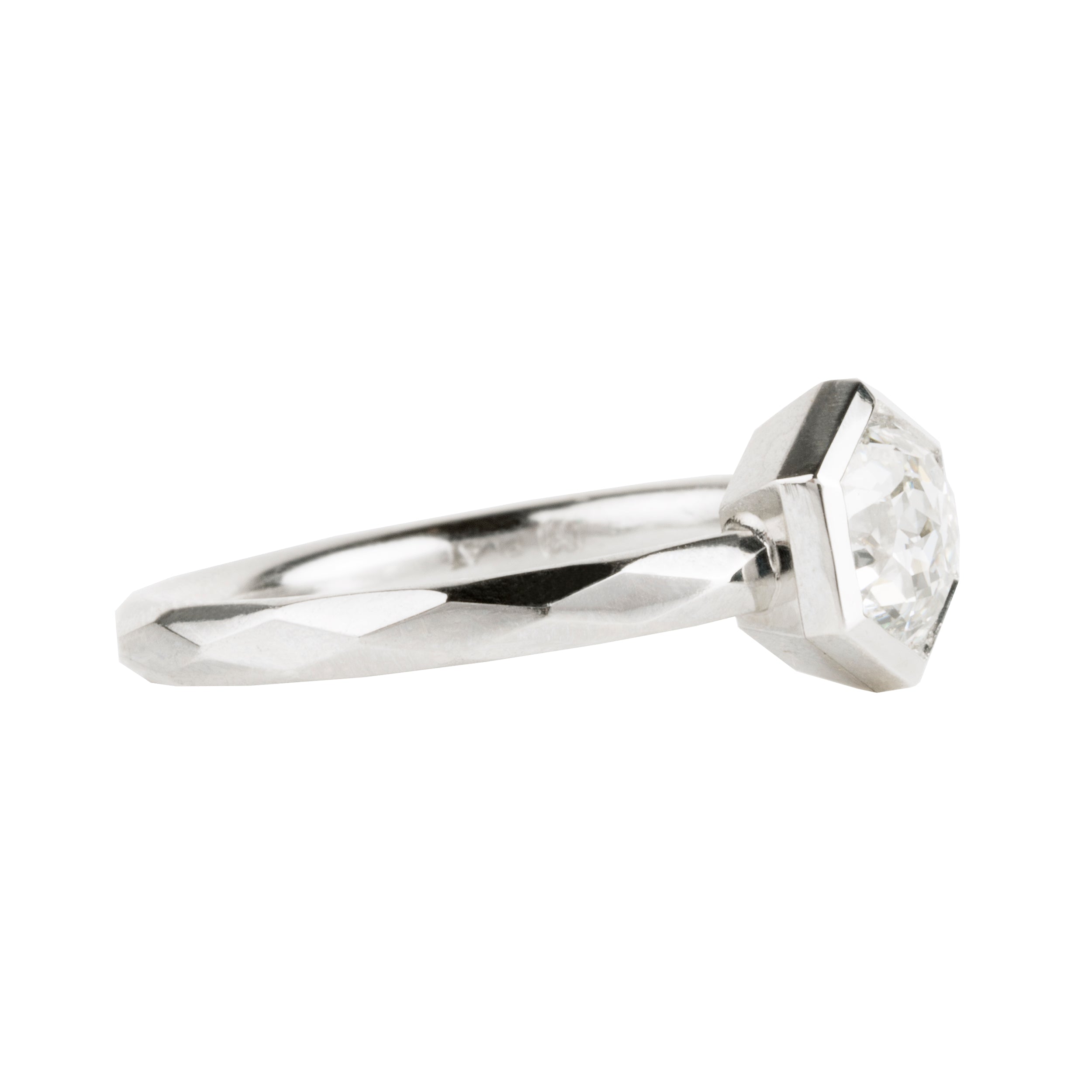 Bell and Bird No. 3929 platinum solitaire ring. Hand facetted band and hexagonal setting with an unusual early 20th century Jubilee cut diamond. This ring features a GIA certified Jubilee cut diamond, 1.10 carat, J color and VS1 clarity.Handcrafted in platinum.
