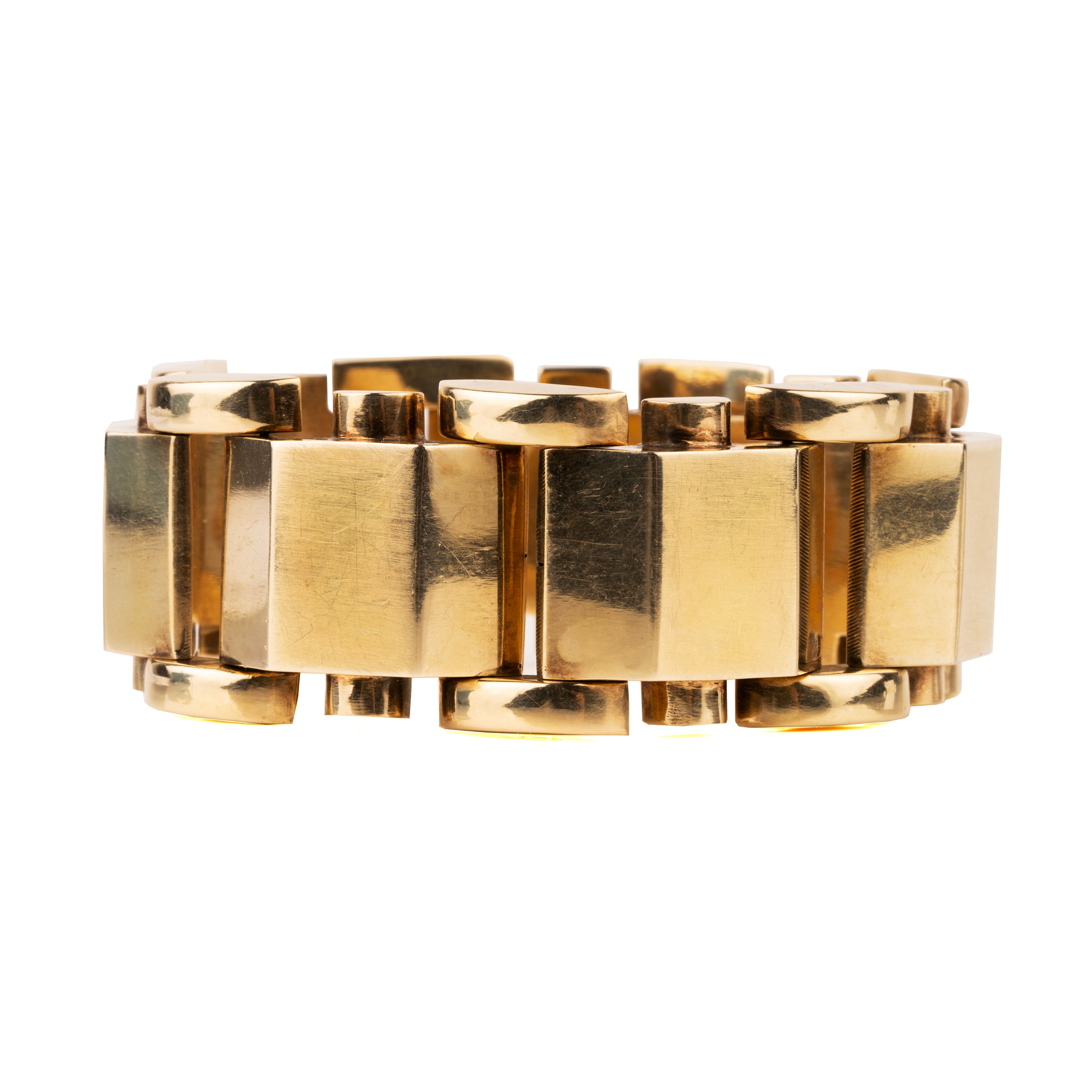Large-scale bracelets like these were popular in the late 1940s. This model has a strong design in 14k gold. America, circa 1945.