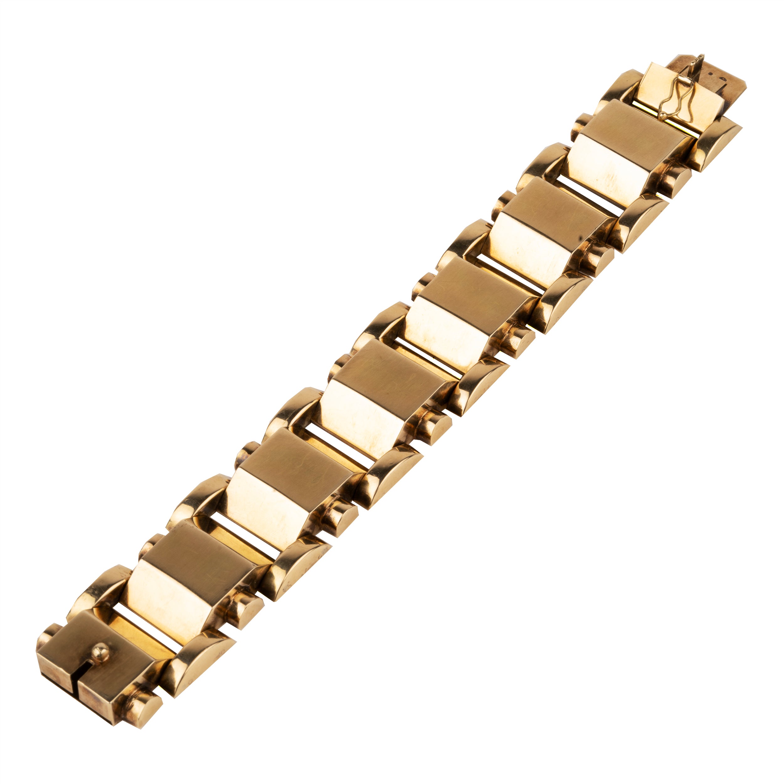 Large-scale bracelets like these were popular in the late 1940s. This model has a strong design in 14k gold. America, circa 1945.