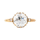 One of our signature Bell and Bird designs.This solitaire ring features a main round old European cut diamond surrounded by 8 single-cut diamonds subtly peeking out from underneath the main stone. There are two additional single-cut diamonds at the base of the whisper-thin, hand-filed knife edge band.  Set in our 18k old gold. This ring features a GIA certified 2.27 carat I color and VS2 clarity old European cut diamond. Handcrafted in our 18k old gold.