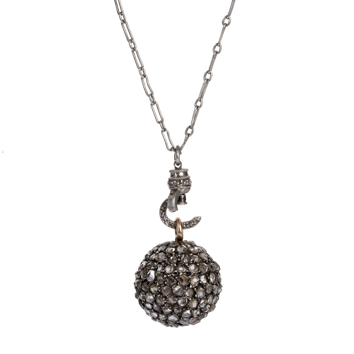 A rare Georgian-era diamond ball pendant is hanging on an early 20th century French platinum chain. Rose-cut diamonds are intricately pavé set in silver, gold, and platinum. The chain has French hallmarks and The ball is English in origin. Circa 1820. Close up of the claps open.