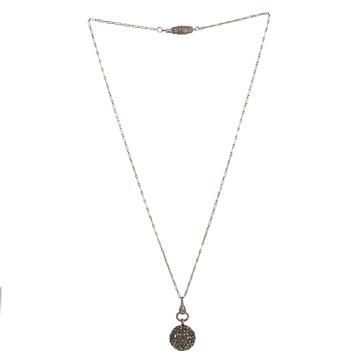 A rare Georgian-era diamond ball pendant is hanging on an early 20th century French platinum chain. Rose-cut diamonds are intricately pavé set in silver, gold, and platinum. The chain has French hallmarks and The ball is English in origin. Circa 1820. full view of the necklace.