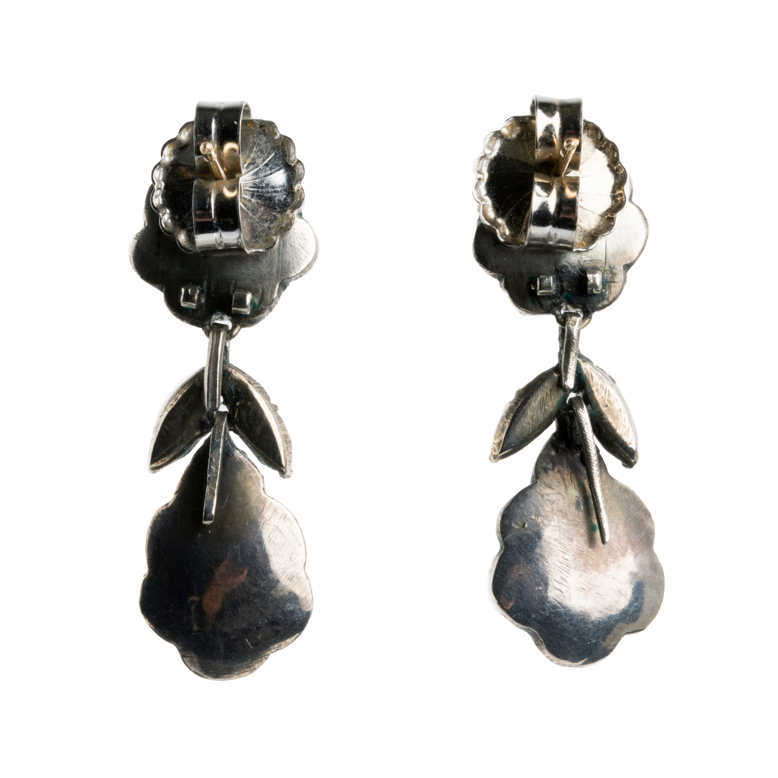 Georgian era rose cut diamond earrings. The diamonds are in a silver closed back setting. Circa 1800, England. Circa 1800. back view.