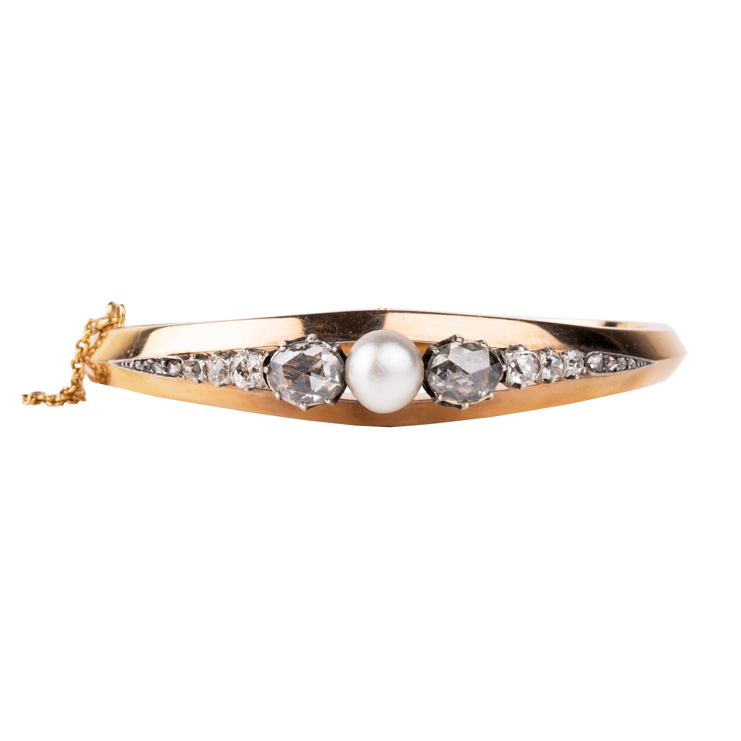 Approximately three carats of rose-cut diamonds are set in silver cut-away settings. The twenty diamonds flank a single natural pearl. The stones taper into a knife-edge detail in 18k rose gold. Continental Europe, circa 1860. Front view.