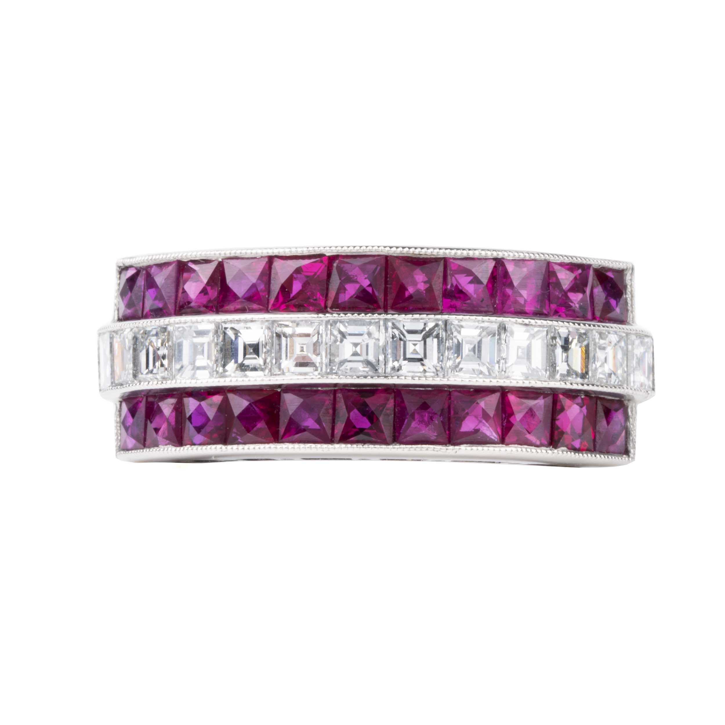 Art Deco style vintage ruby and diamond ring, in platinum setting. Approximately 3.26 carats of bright red French cut rubies and 1.26 carats of French cut diamonds. Front view.