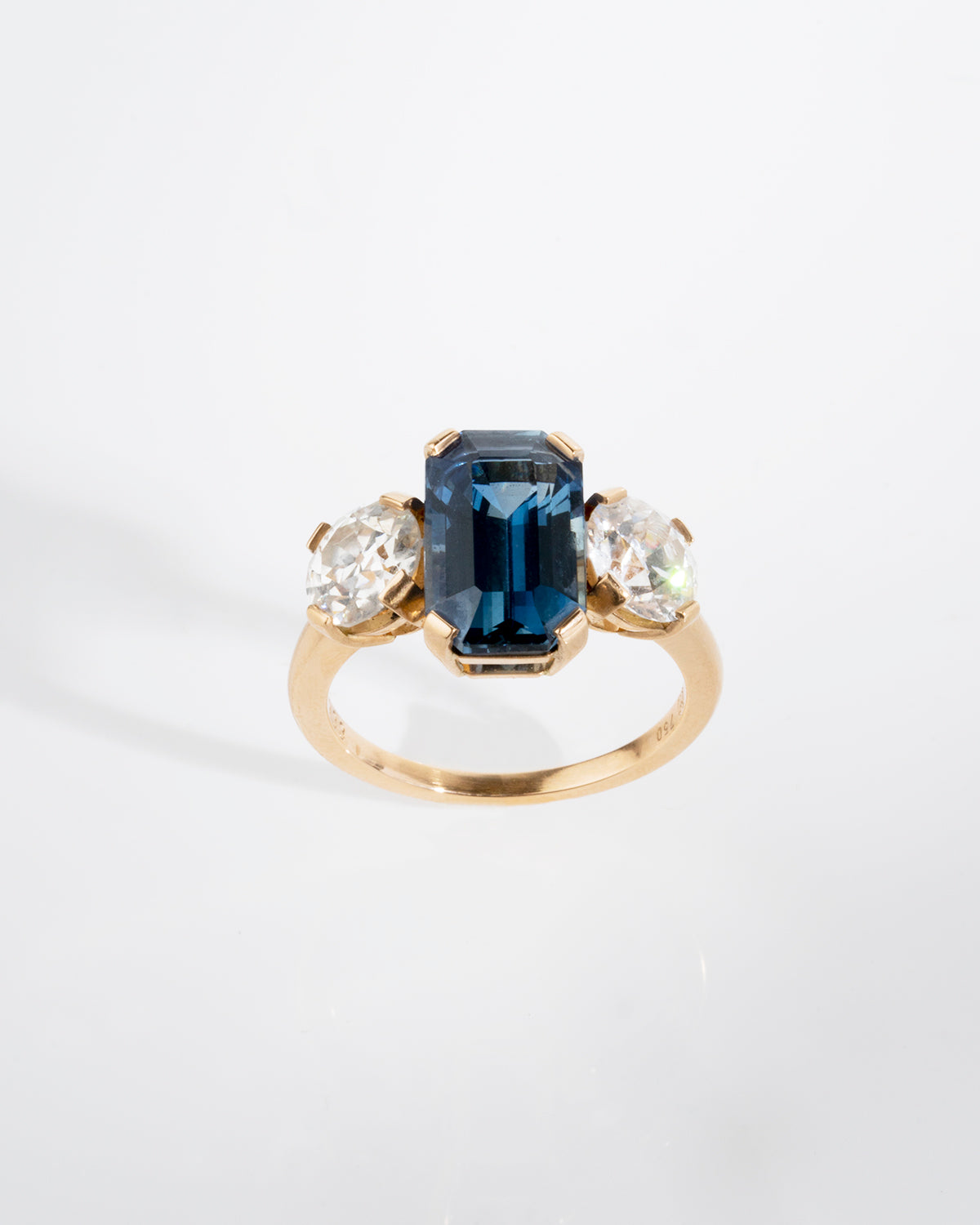 Bell & Bird Sapphire and diamond three stone ring. Front View.