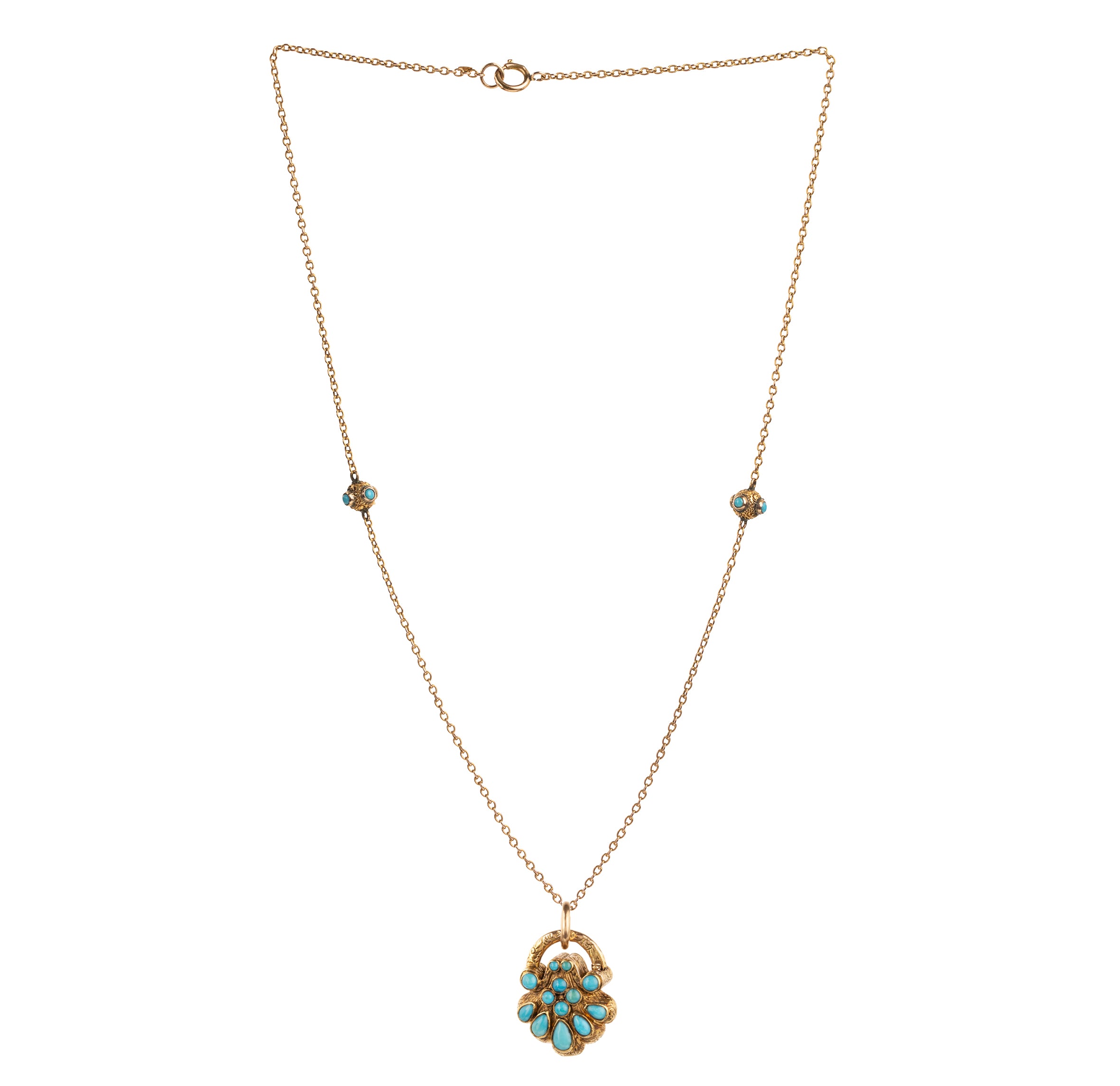 Early Victorian era turquoise padlock locket in 15k gold. It is in the form of a shell with Persian turquoise and a glazed compartment. English in origin. Circa 1840. Hanging on an antique 15k gold turquoise beaded ball chain.