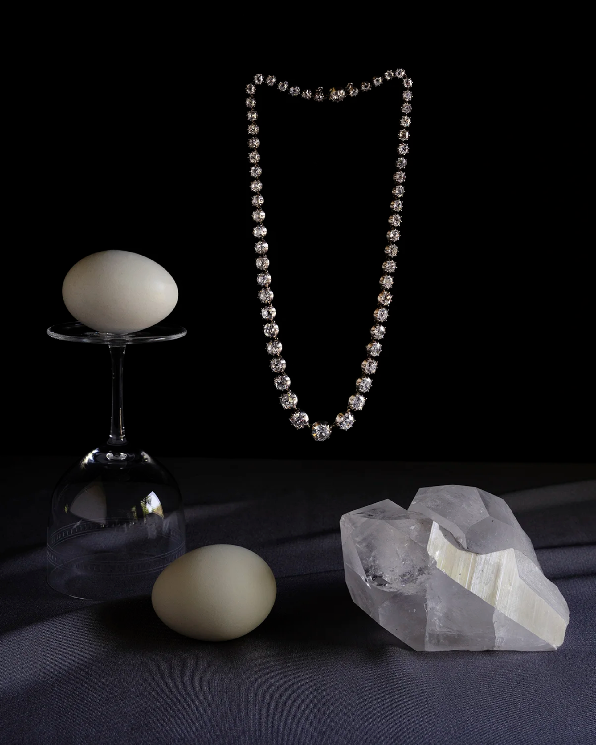 Still life photo of an antique diamond necklace