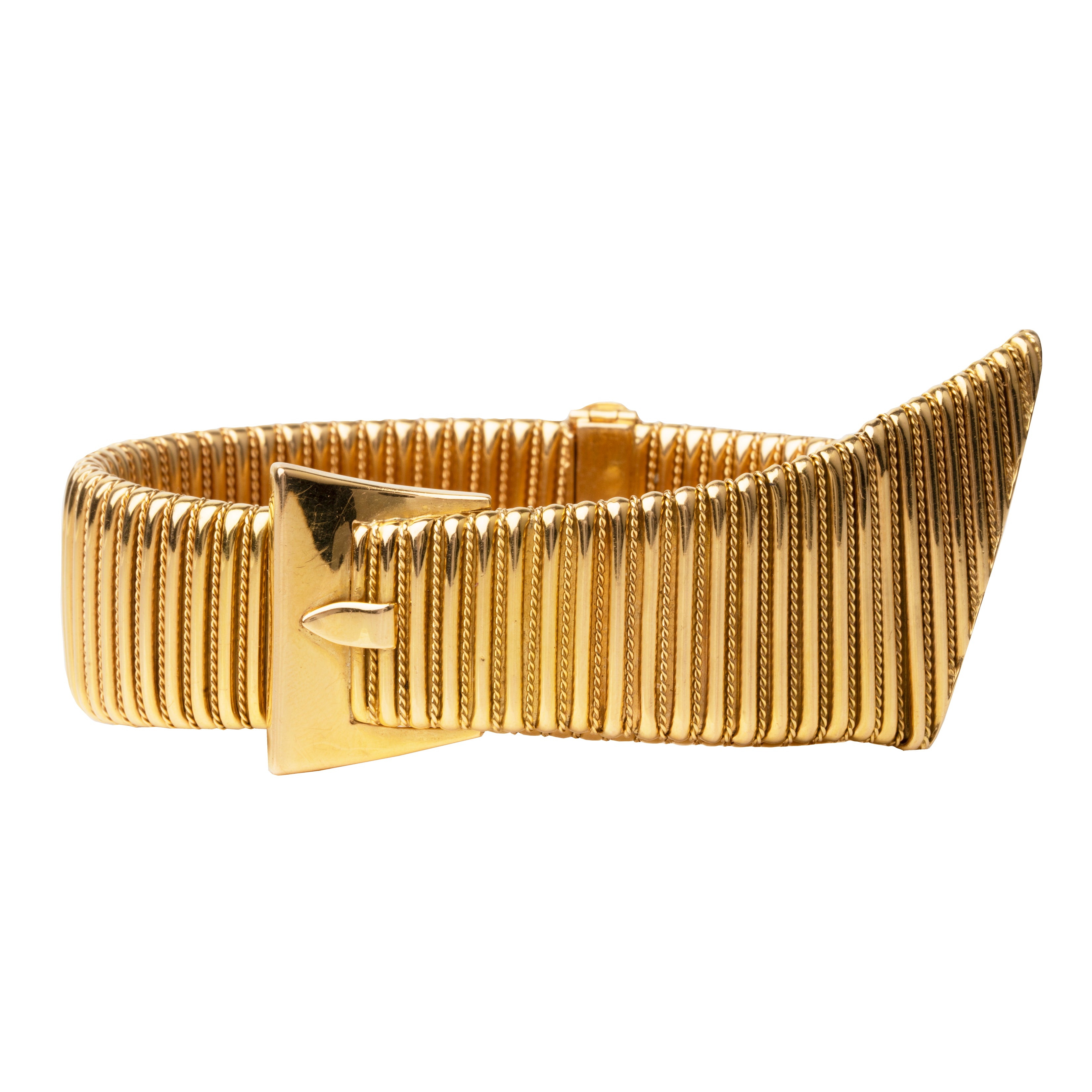Chic gas-pipe bracelet. An outstanding design with a clever locking clasp mechanism and a French maker's mark. French in origin. Mid 20th century. 18k gold. 