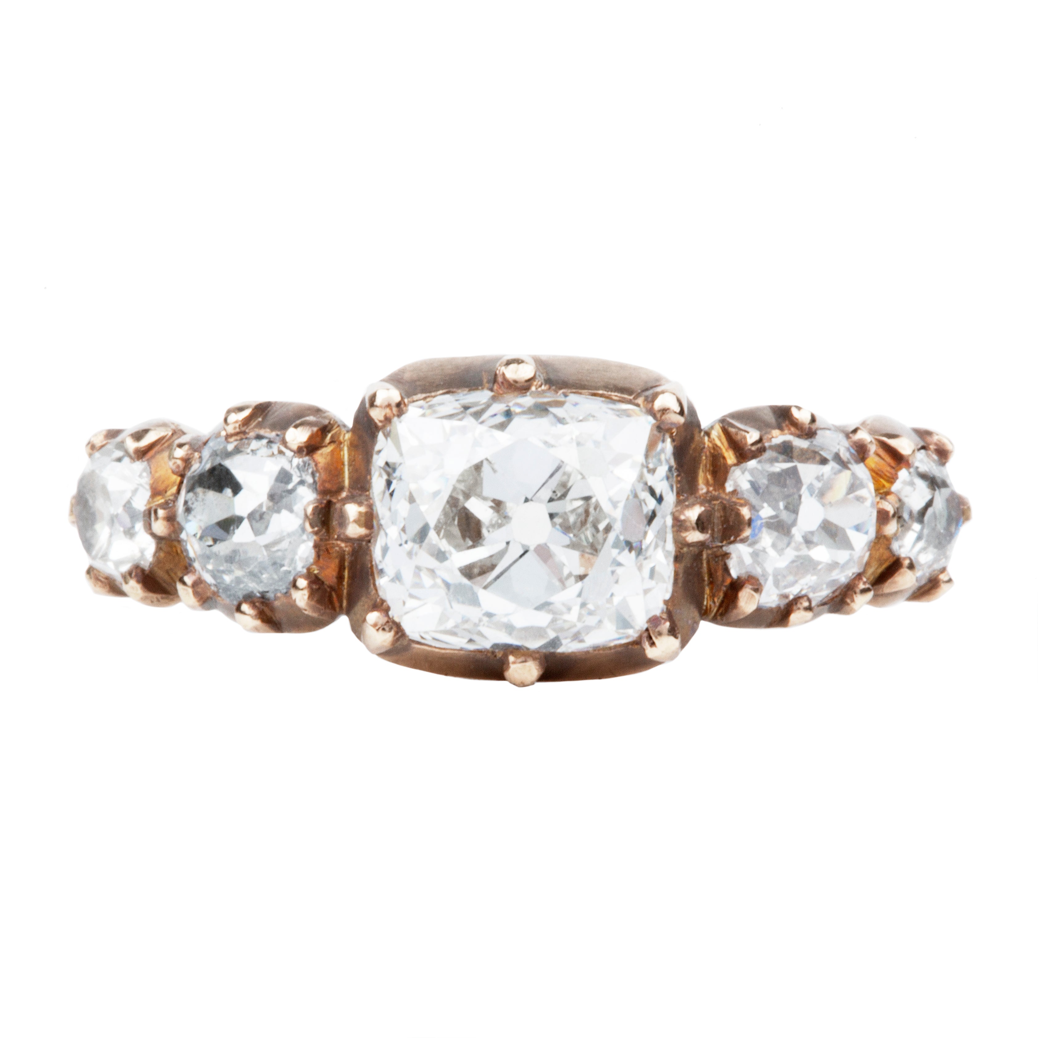 A handmade 5 stone old mine cut diamond ring with a 1.76 carat center diamond and descending side stones, set in a custom blend of 18K rose gold.