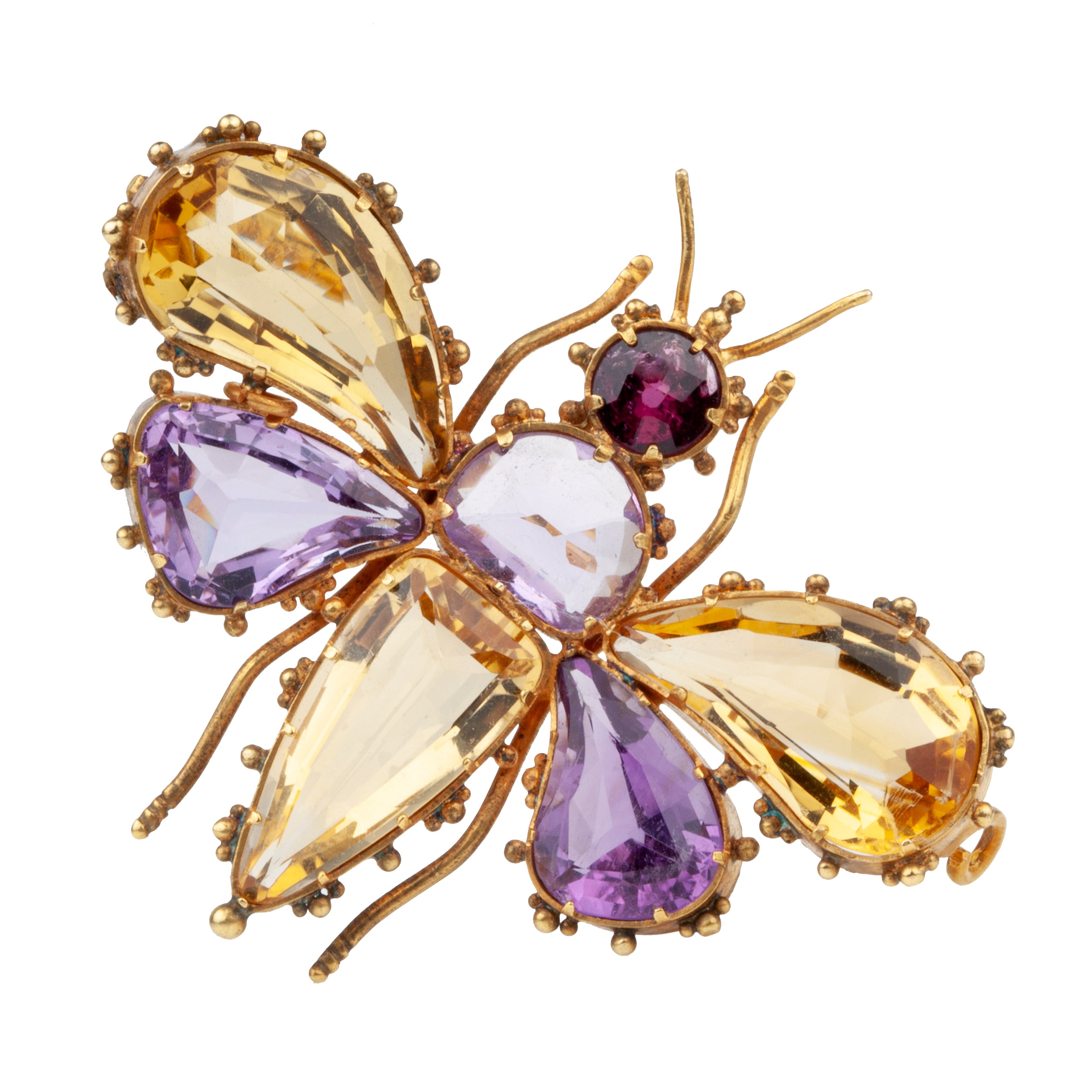 Finely made early Victorian citrine, amethyst and garnet butterfly brooch, set in gold. Beautiful combination of contrasting amethyst and citrine wings. In Etruscan revival motif. English in origin. Circa 1850. Close-up view.