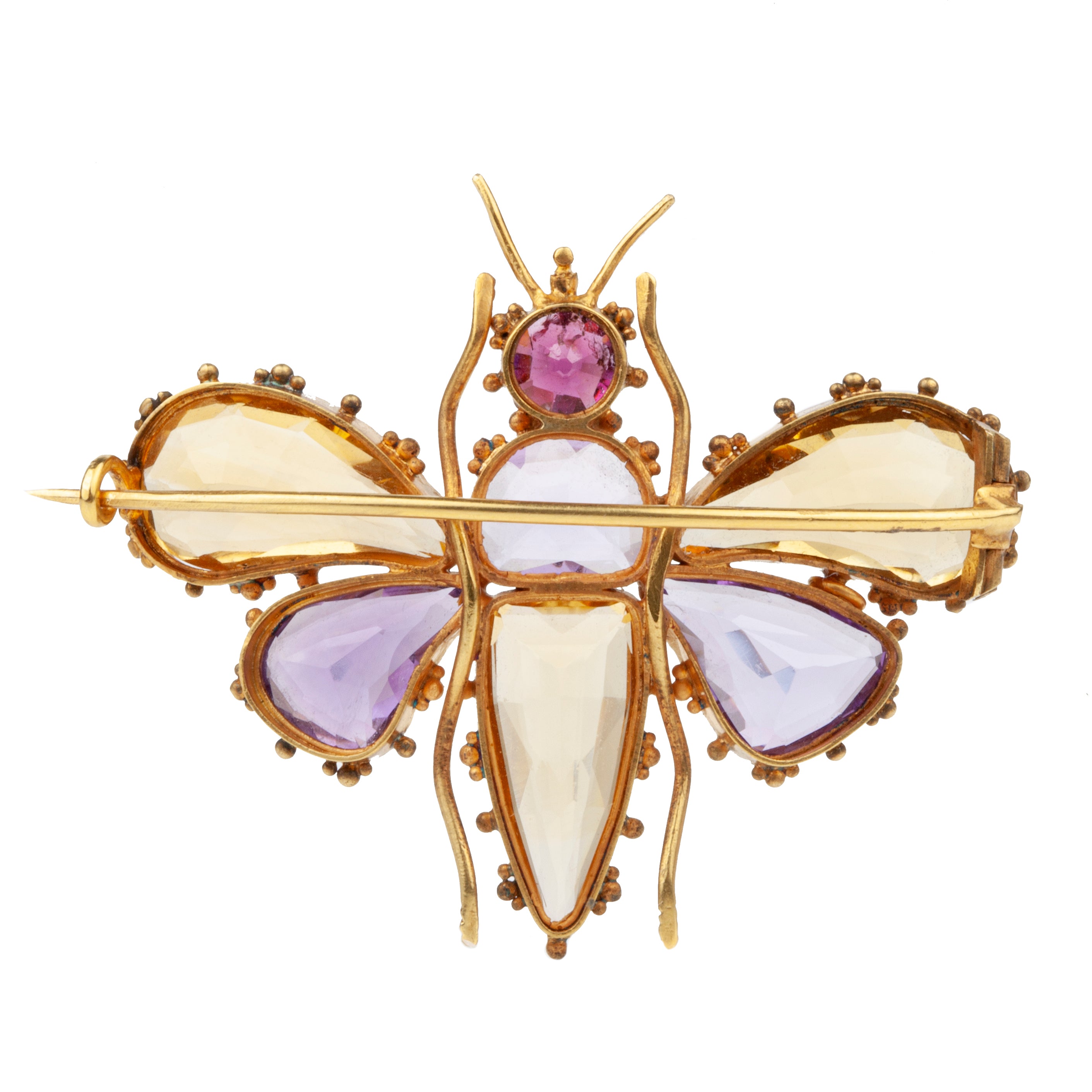 Finely made early Victorian citrine, amethyst and garnet butterfly brooch, set in gold. Beautiful combination of contrasting amethyst and citrine wings. In Etruscan revival motif. English in origin. Circa 1850. Close-up back side view.