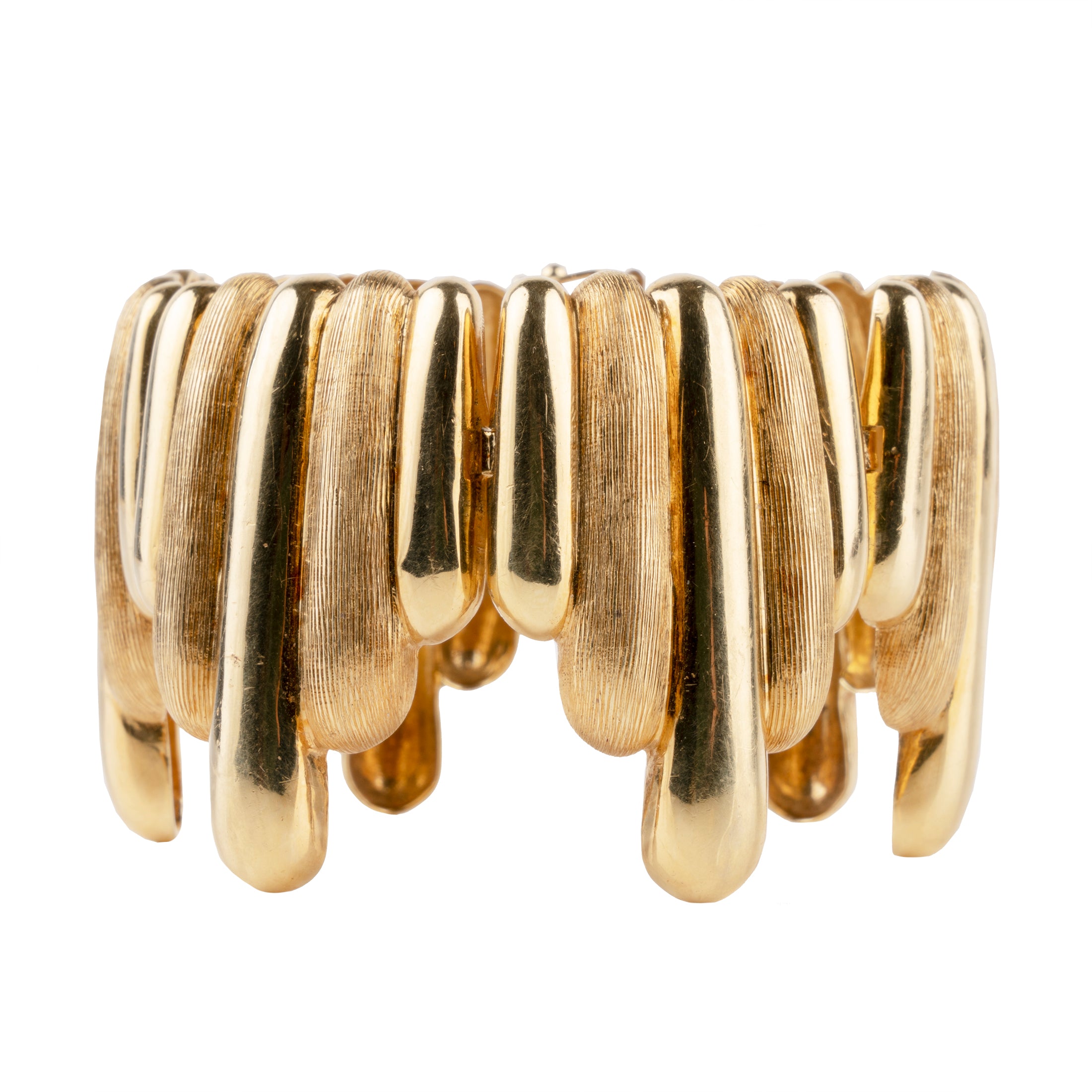 Vintage Gold Surrealist Bracelet. Striking 18k gold bracelet with a dripping motif. Signed by an Italian Maker. Mid 20th century.
