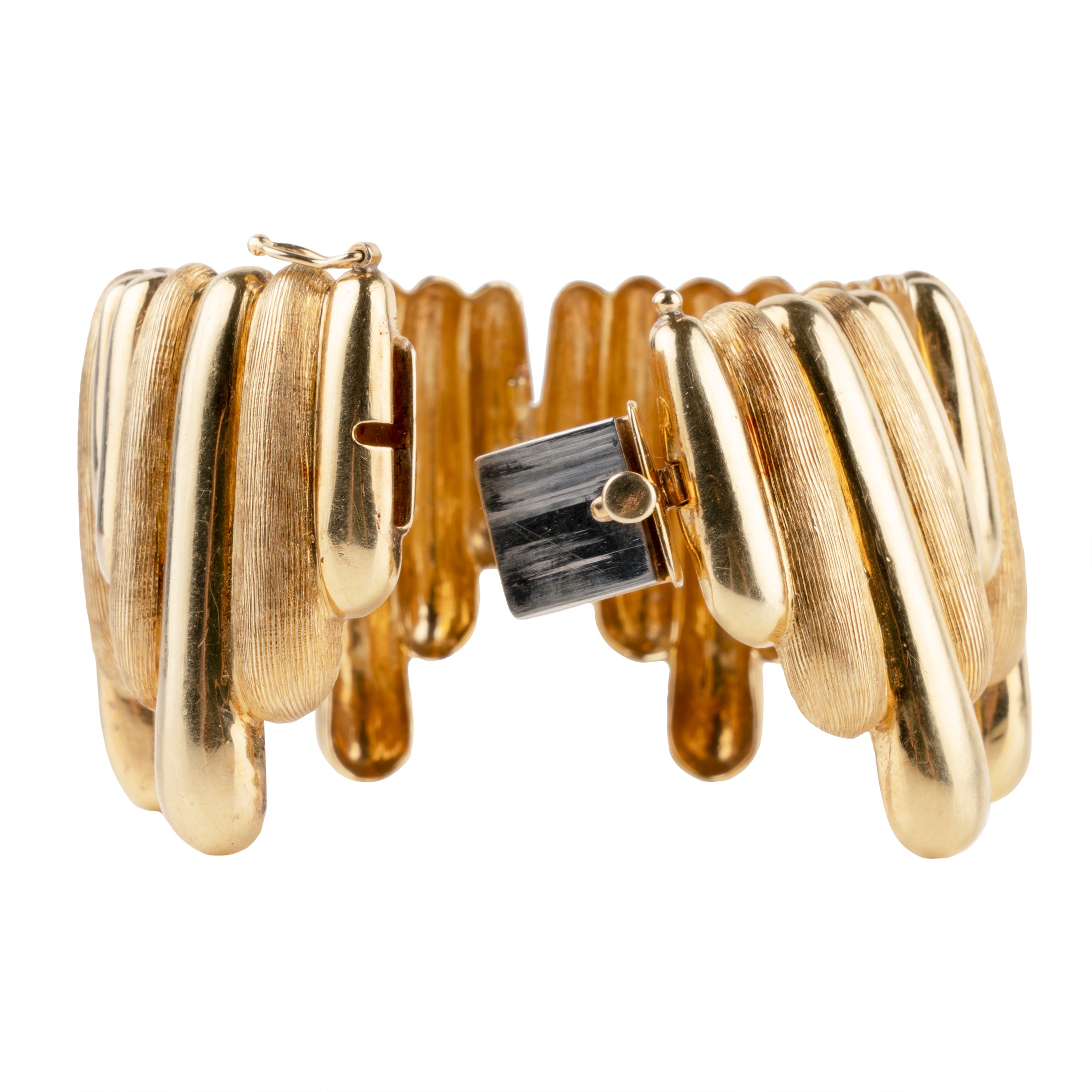 Vintage Gold Surrealist Bracelet. Striking 18k gold bracelet with a dripping motif. Signed by an Italian Maker. Mid 20th century.