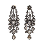 Superb 19th-century diamond earrings in naturalist motifs. Set silver on 18k gold with bright foil-backed settings. The beautiful rose-cut diamonds are estimated to weigh 8 carats in combined weight. There are many hinged elements allowing for lively movement. France, circa 1860. Front view.