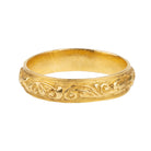A rare excavated ring. Dating to the late 17th Century in 22k gold, 5mm wide. There would have originally been enamel within the deeply chased design. Excavated in England. Circa 1680.