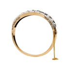 Victorian revival diamond bangle, in silver topped 15k gold. Eleven graduated old European cut diamonds, approximately 4 carats in total diamond weight. Found in Finland. European in origin. Circa 1920.&nbsp;