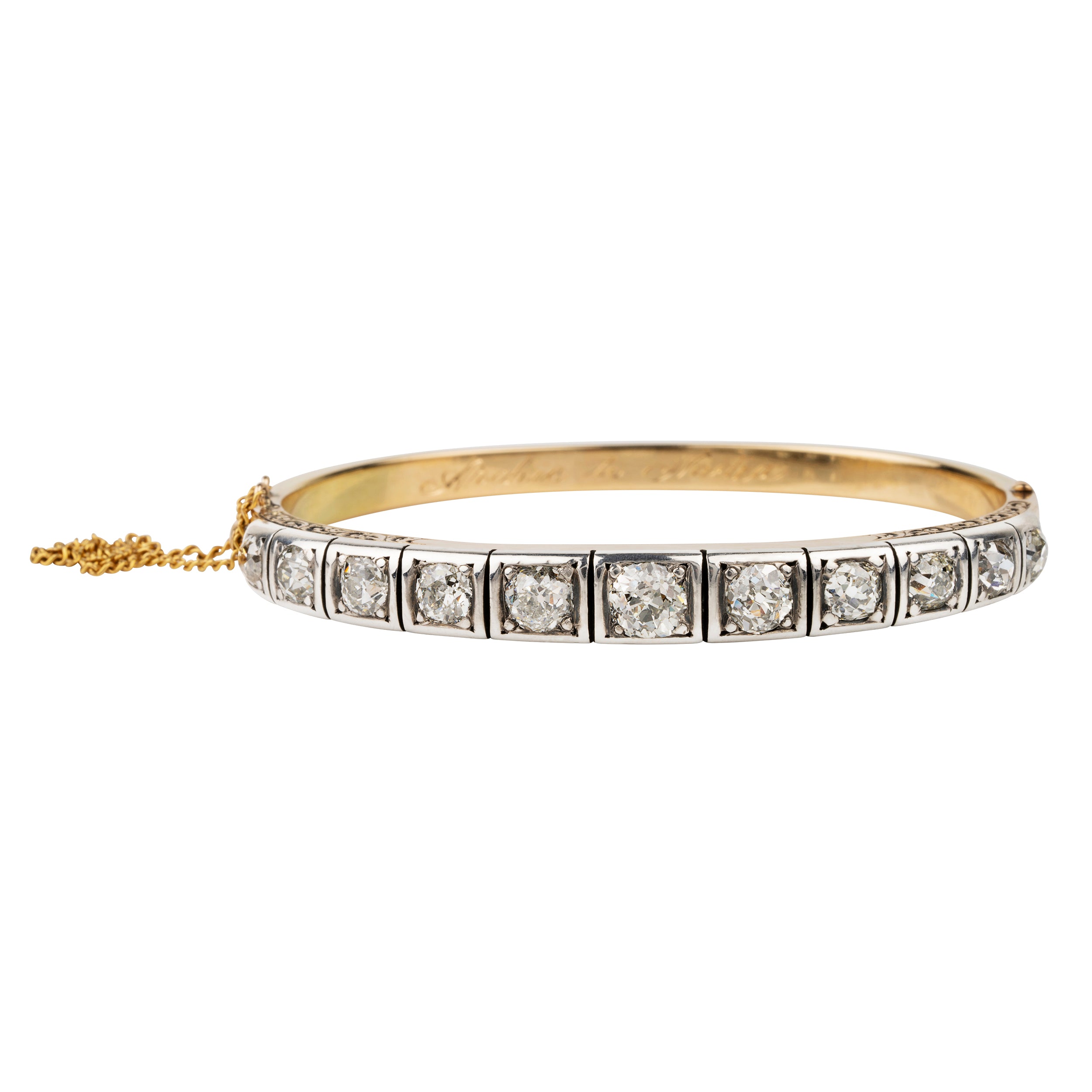 Victorian revival diamond bangle, in silver topped 15k gold. Eleven graduated old European cut diamonds, approximately 4 carats in total diamond weight. Found in Finland. European in origin. Circa 1920.&nbsp;