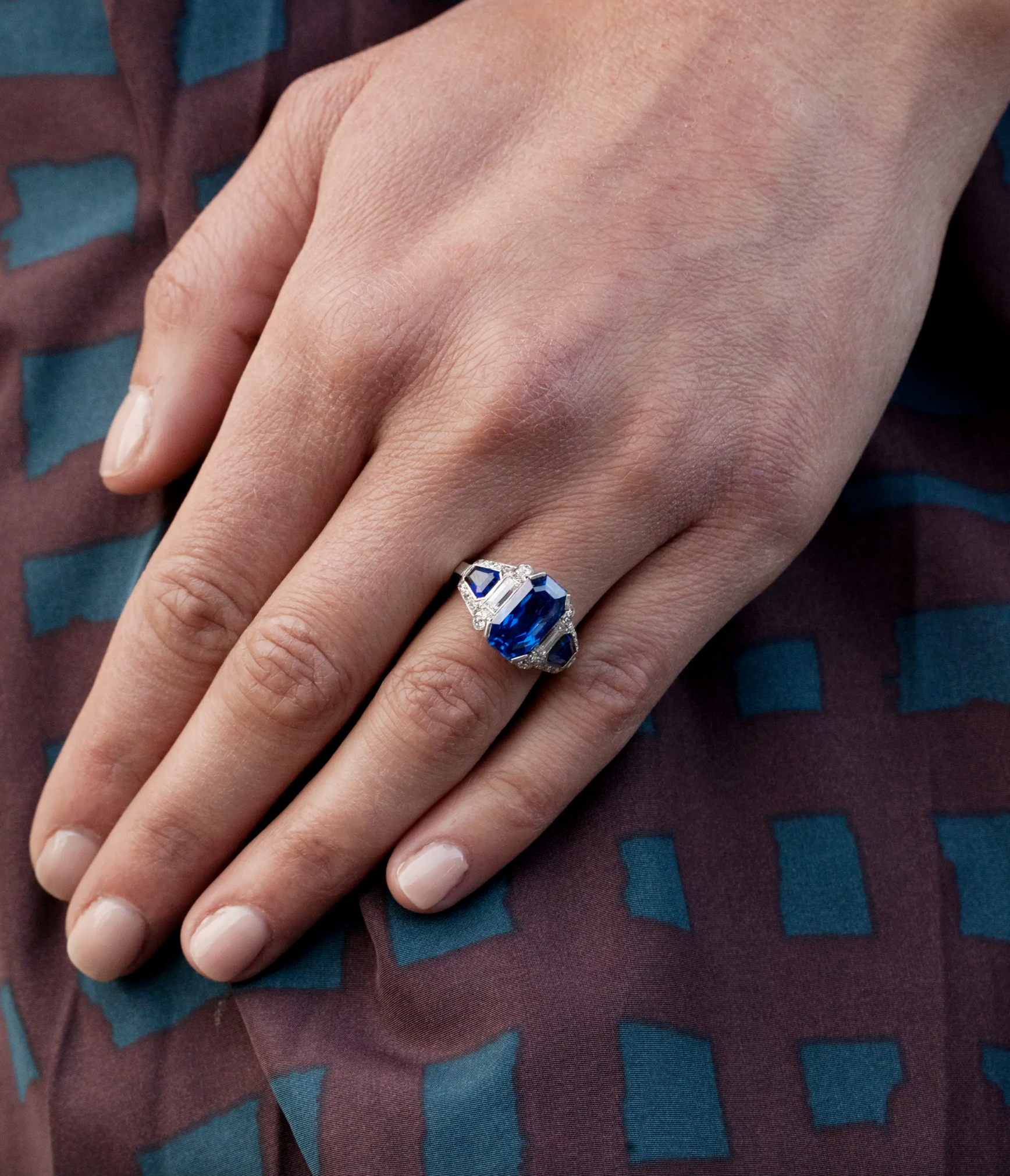 Antique Platinum Sapphire and Diamond Ring on a Model's hand 